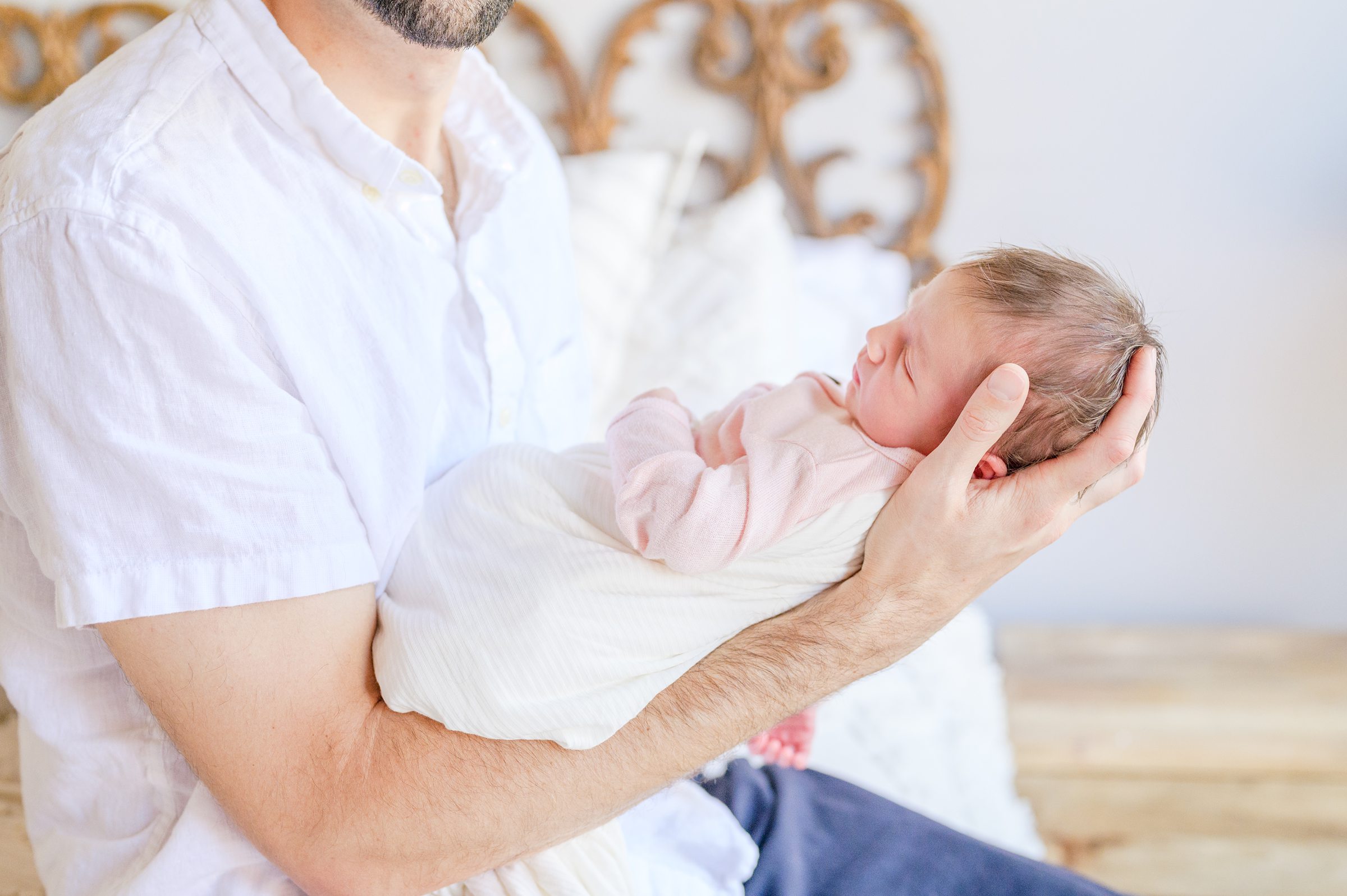 Newborn photos at an in-home lifestyle newborn session in Baltimore, Maryland photographed by Baltimore Maternity Photographer Cait Kramer.