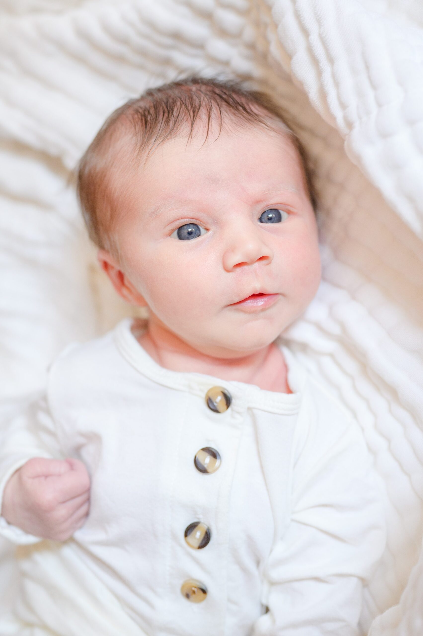 Newborn photos at an in-home lifestyle newborn session in Baltimore, Maryland photographed by Baltimore Maternity Photographer Cait Kramer.