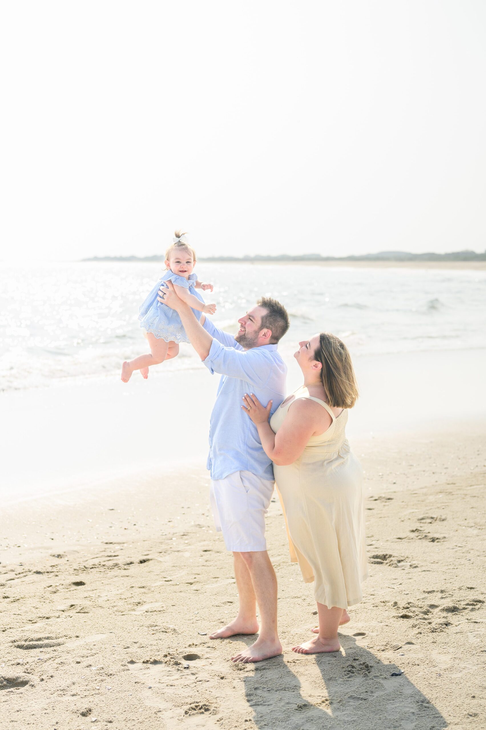 Extended family portraits at Cape May's Cove beach in Maryland, photographed by Cape May Family Photographer Cait Kramer.