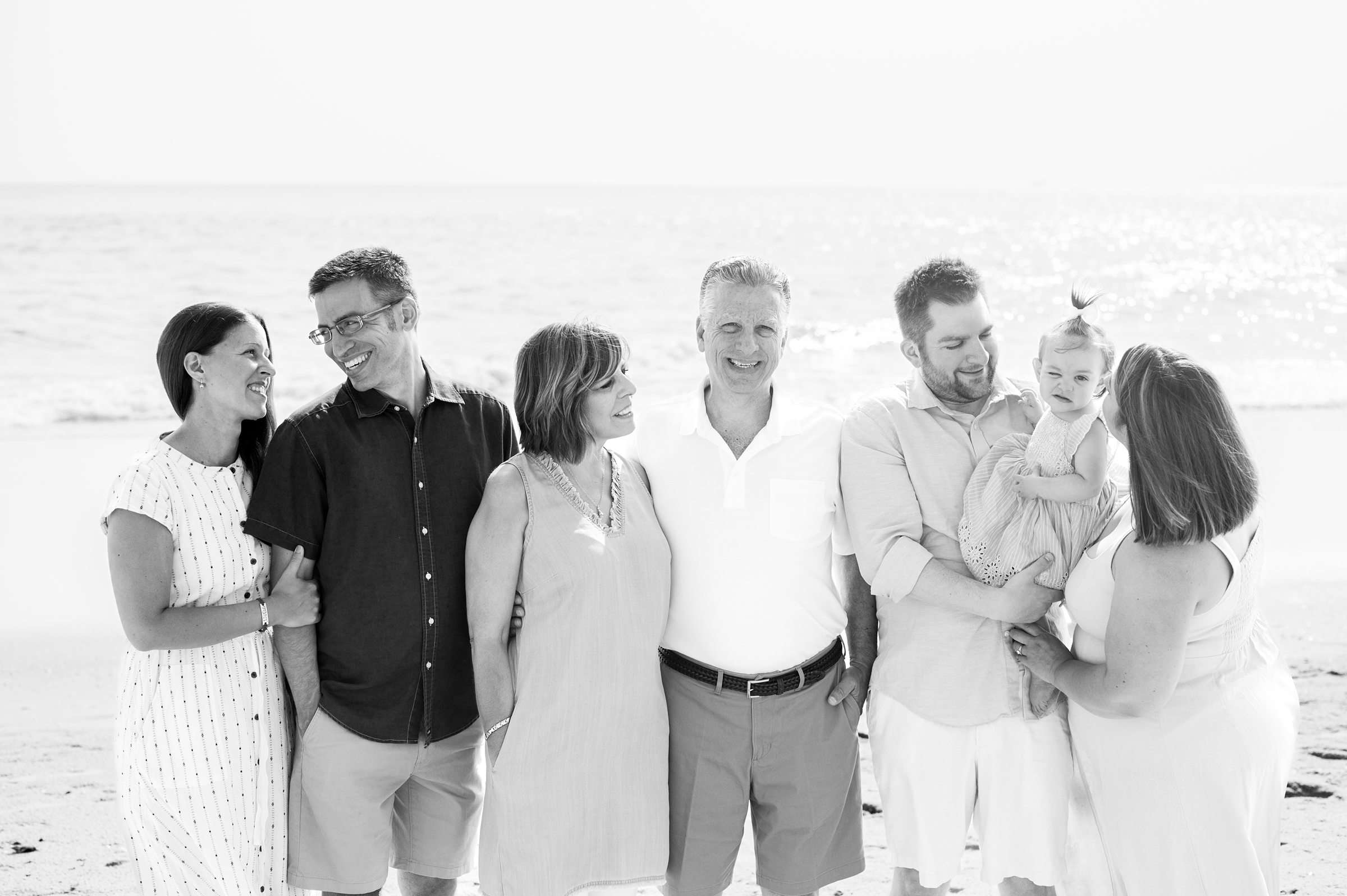 Extended family portraits at Cape May's Cove beach in Maryland, photographed by Cape May Family Photographer Cait Kramer.