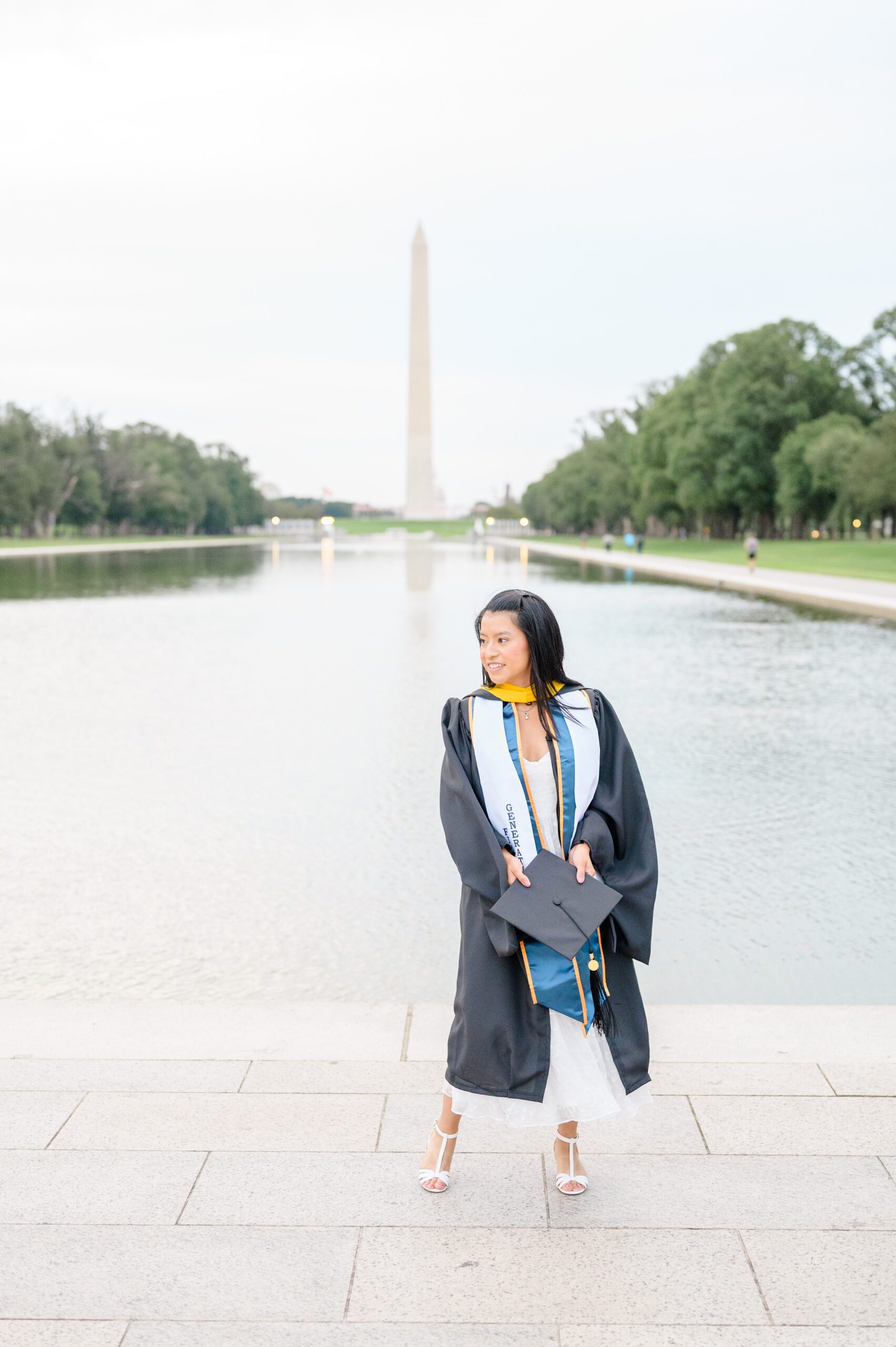 College graduation portrait session at the DC War Memorial in Washington, D.C. photographed by Baltimore Grad Photographer Cait Kramer.