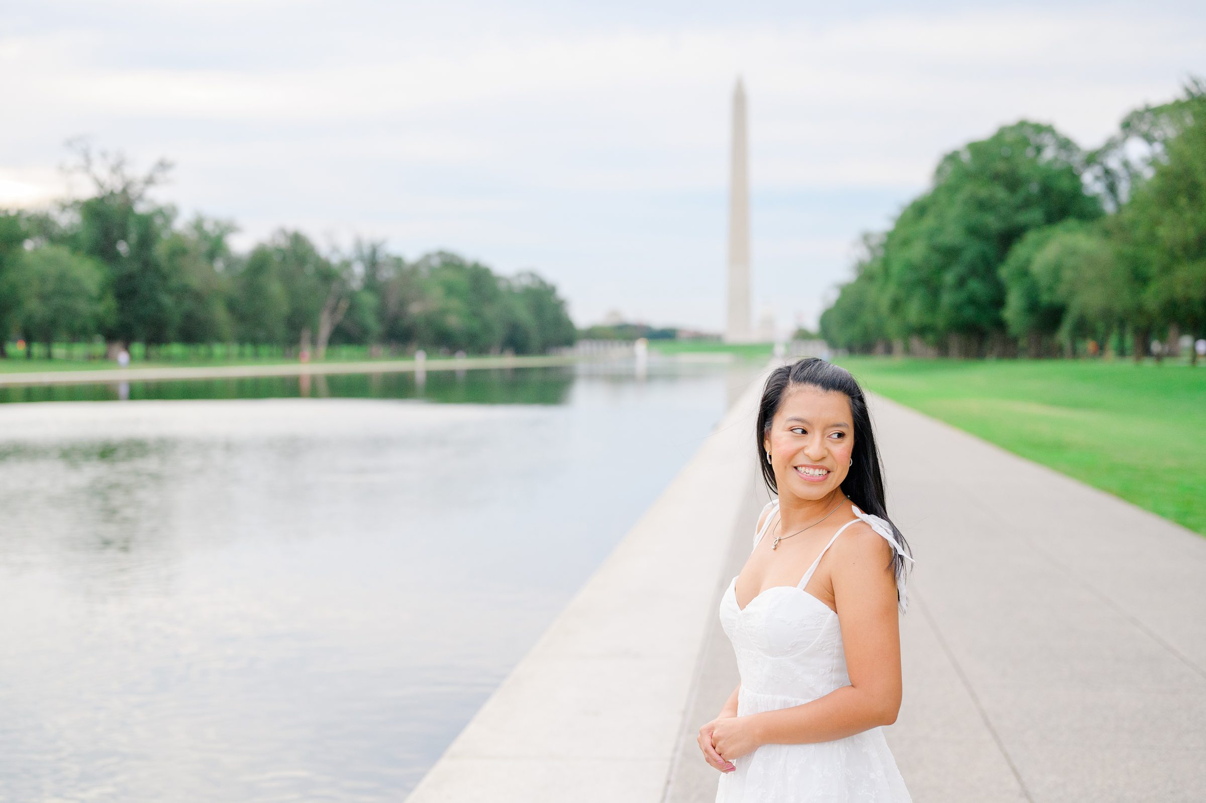 College graduation portrait session at the DC War Memorial in Washington, D.C. photographed by Baltimore Grad Photographer Cait Kramer.