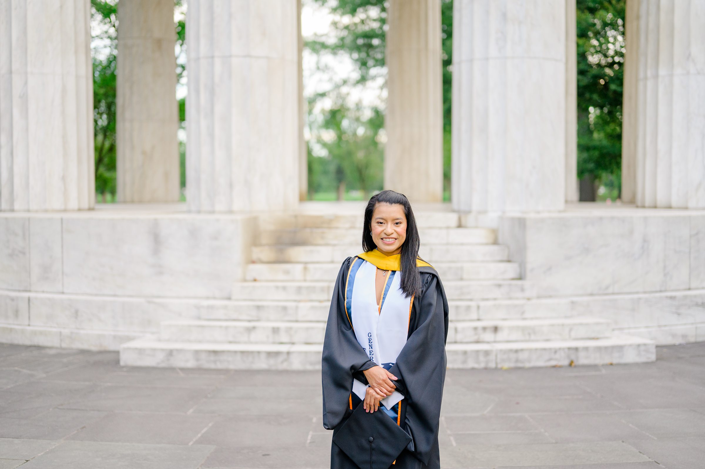 College graduation portrait session at the DC War Memorial in Washington, D.C. photographed by Baltimore Grad Photographer Cait Kramer.