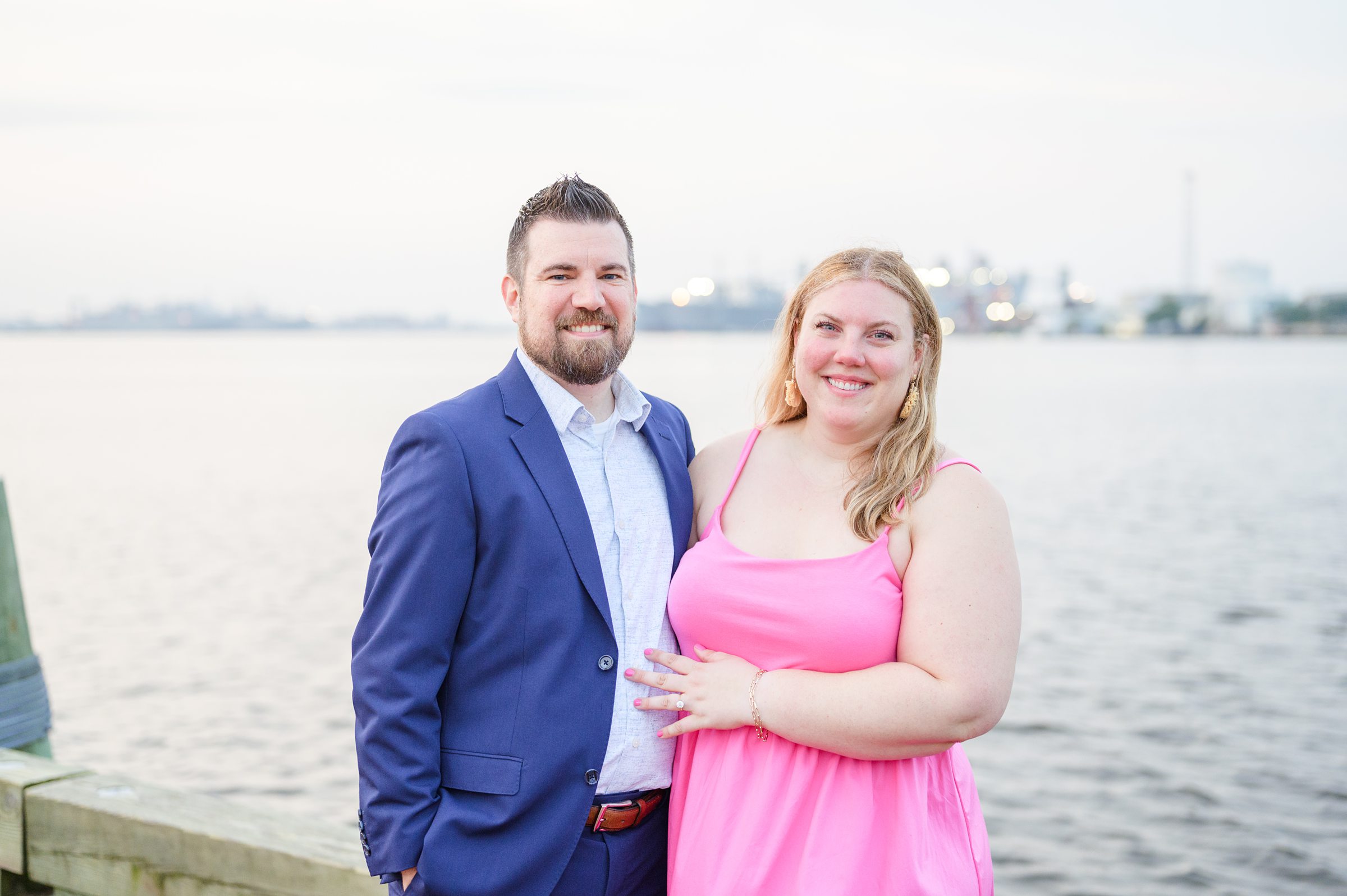 Engaged couple at Fells Point Waterfront for their sunrise engagement session in Baltimore, Maryland photographed by Baltimore Wedding Photographer Cait Kramer Photography.