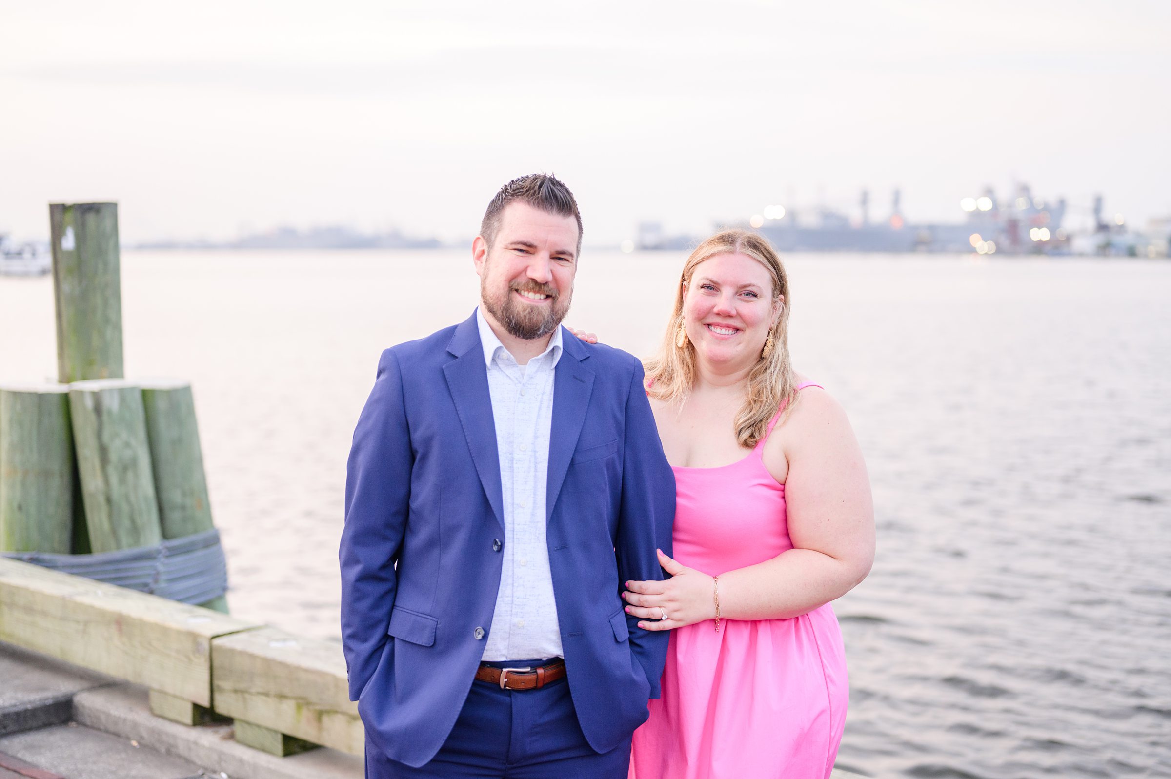 Engaged couple at Fells Point Waterfront for their sunrise engagement session in Baltimore, Maryland photographed by Baltimore Wedding Photographer Cait Kramer Photography.