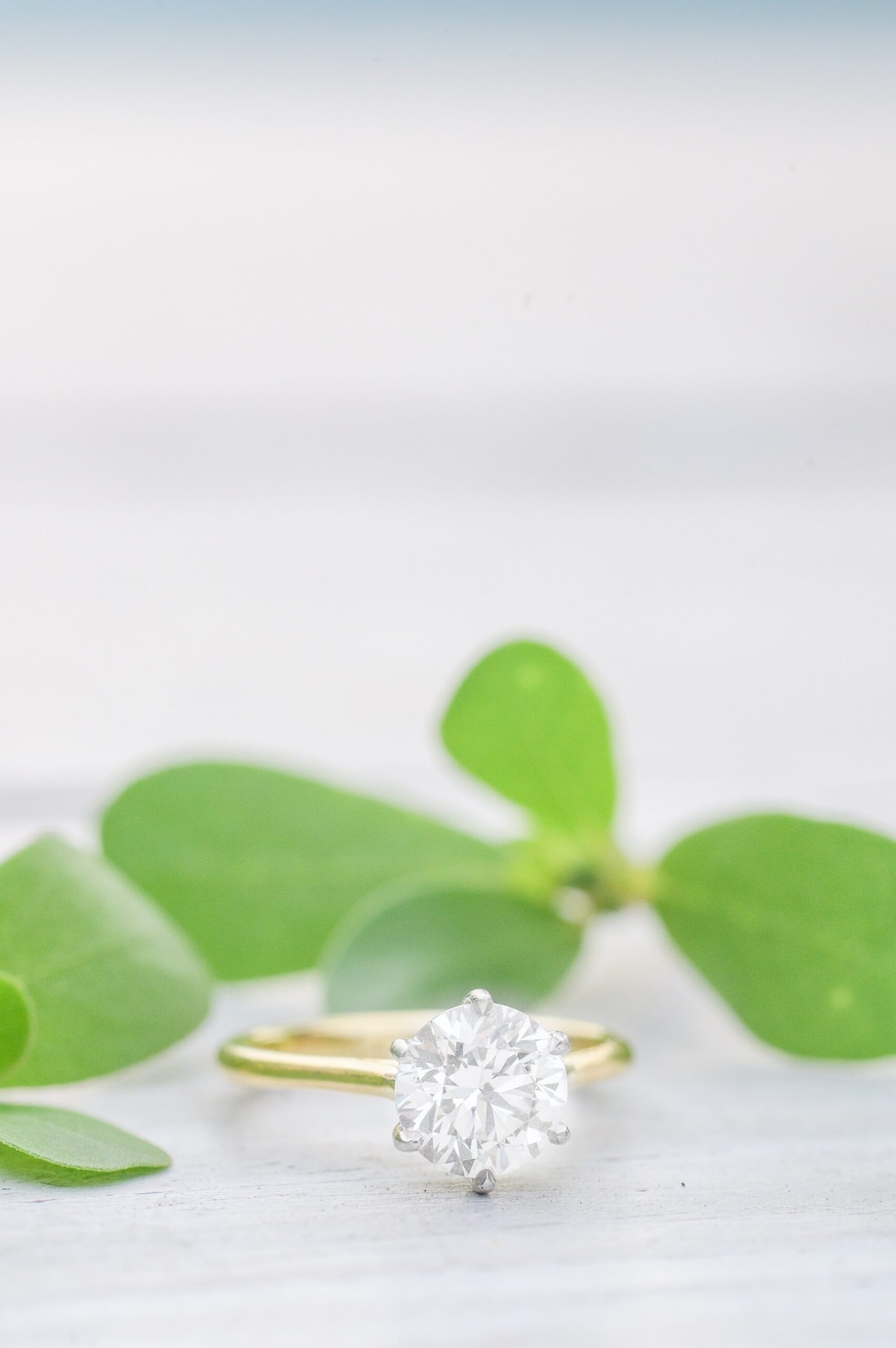 Engaged couple at Fells Point Waterfront for their sunrise engagement session in Baltimore, Maryland photographed by Baltimore Wedding Photographer Cait Kramer Photography.