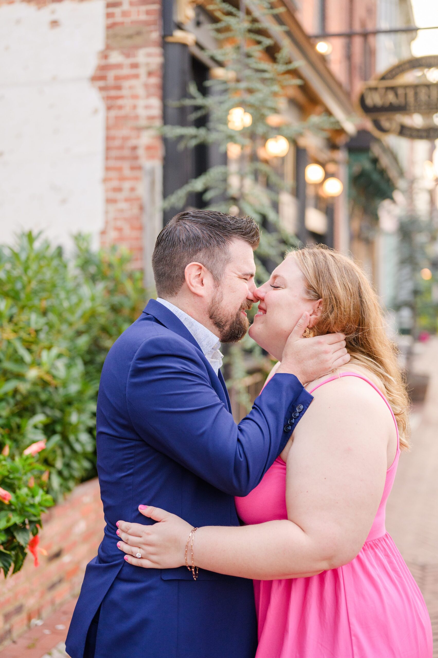 Engaged couple at Fells Point Waterfront for their sunrise engagement session in Baltimore, Maryland photographed by Baltimore Wedding Photographer Cait Kramer Photography.