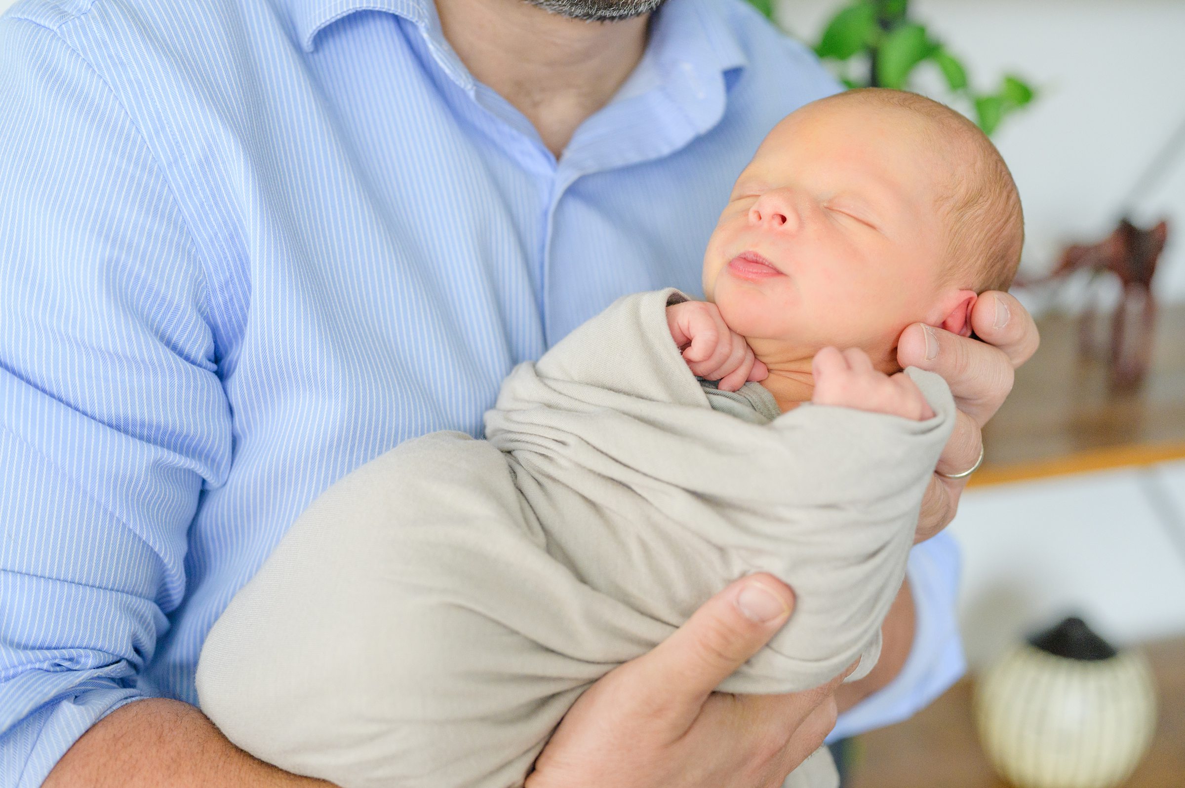 In-home newborn and family portrait session in Washington, D.C. photographed by Lifestyle Newborn Photographer Cait Kramer Photography.