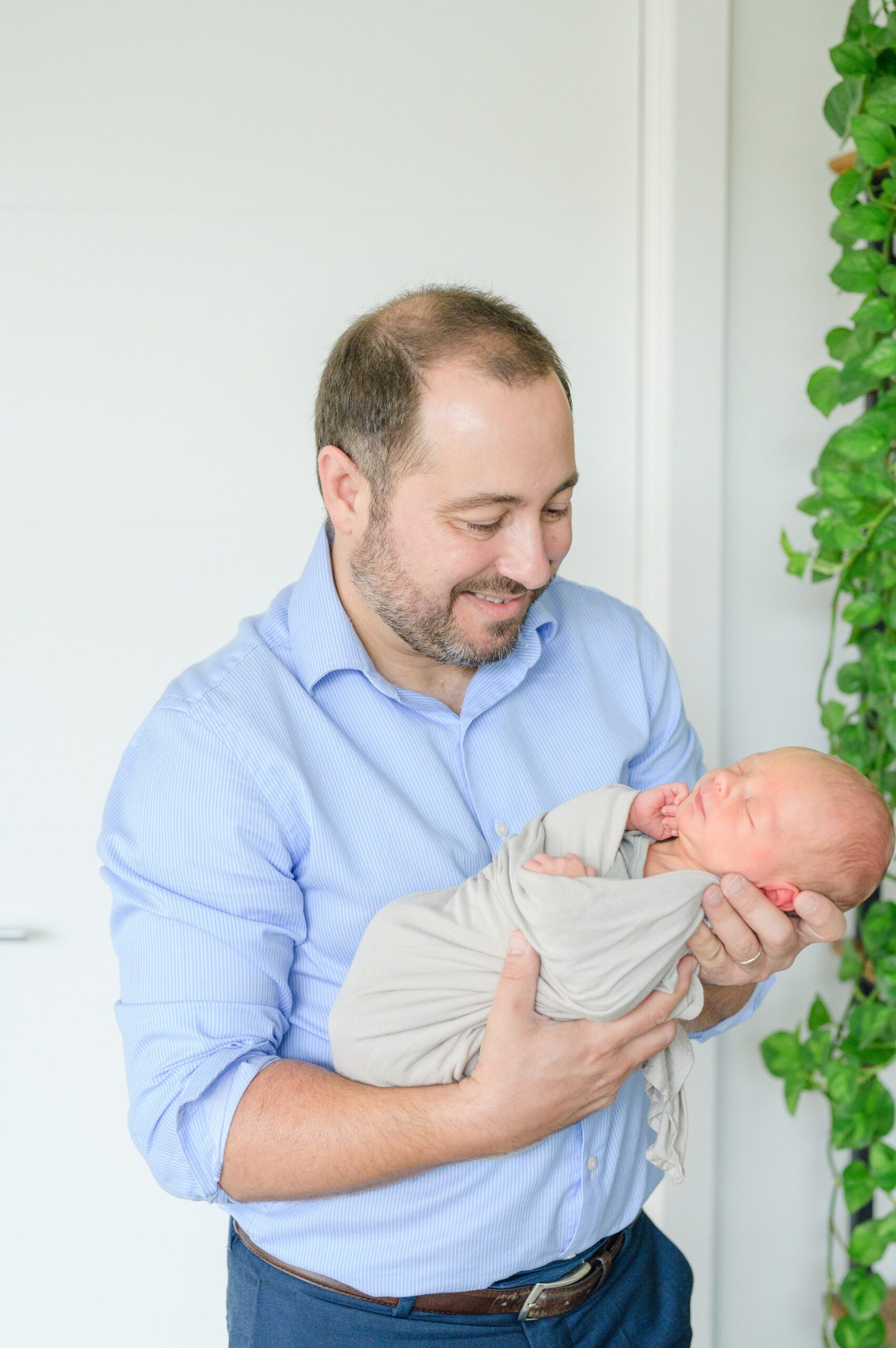 In-home newborn and family portrait session in Washington, D.C. photographed by Lifestyle Newborn Photographer Cait Kramer Photography.