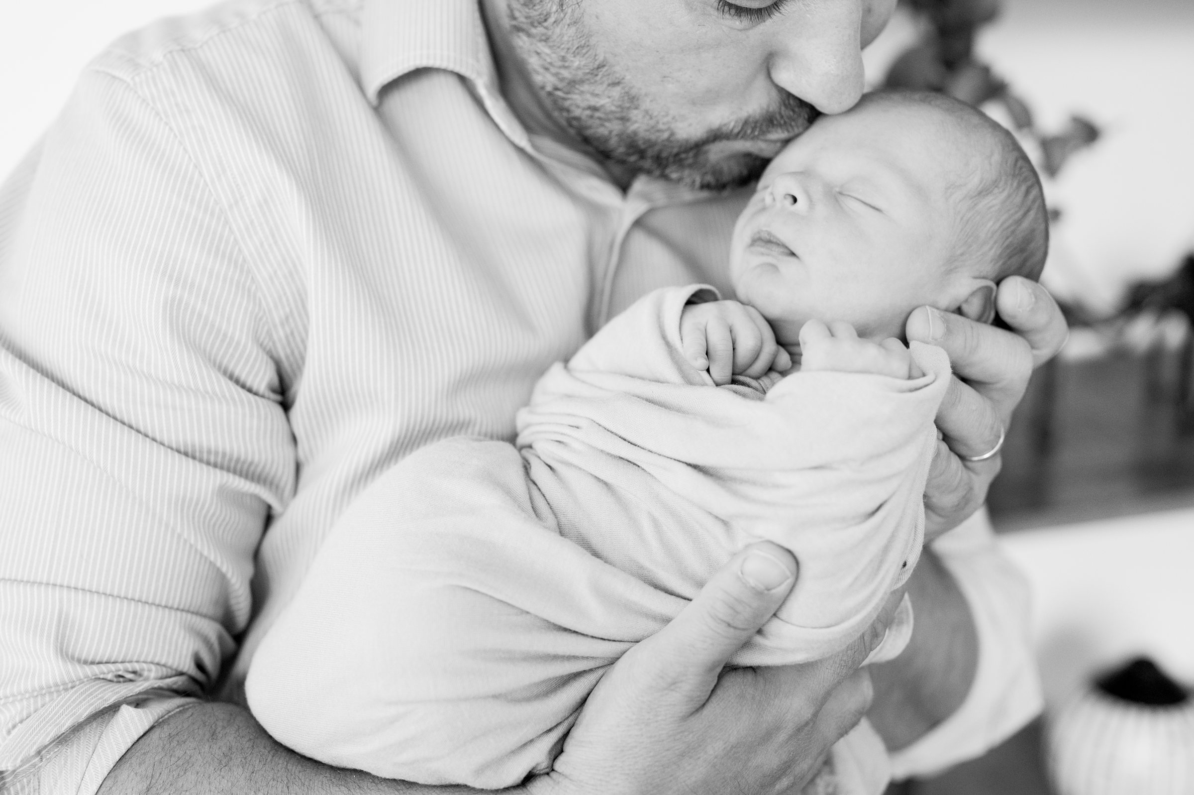 In-home newborn and family portrait session in Washington, D.C. photographed by Lifestyle Newborn Photographer Cait Kramer Photography.