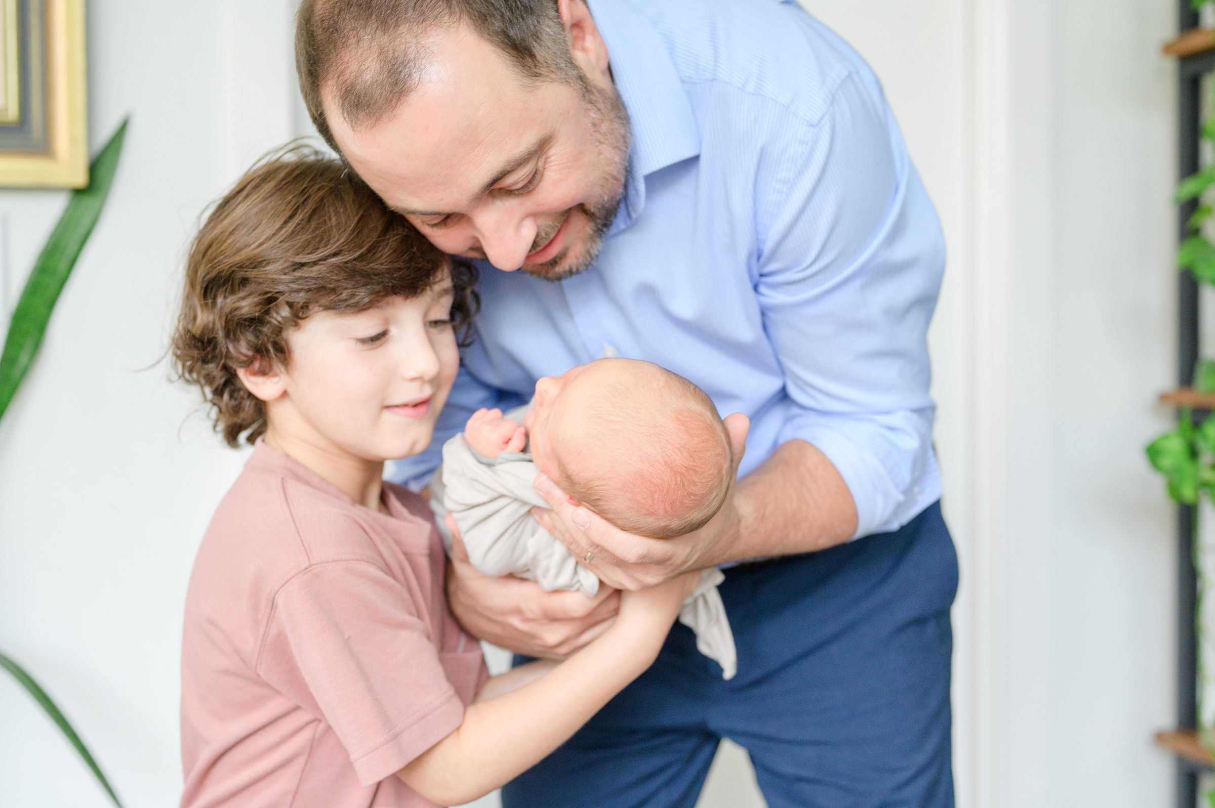 In-home newborn and family portrait session in Washington, D.C. photographed by Lifestyle Newborn Photographer Cait Kramer Photography.