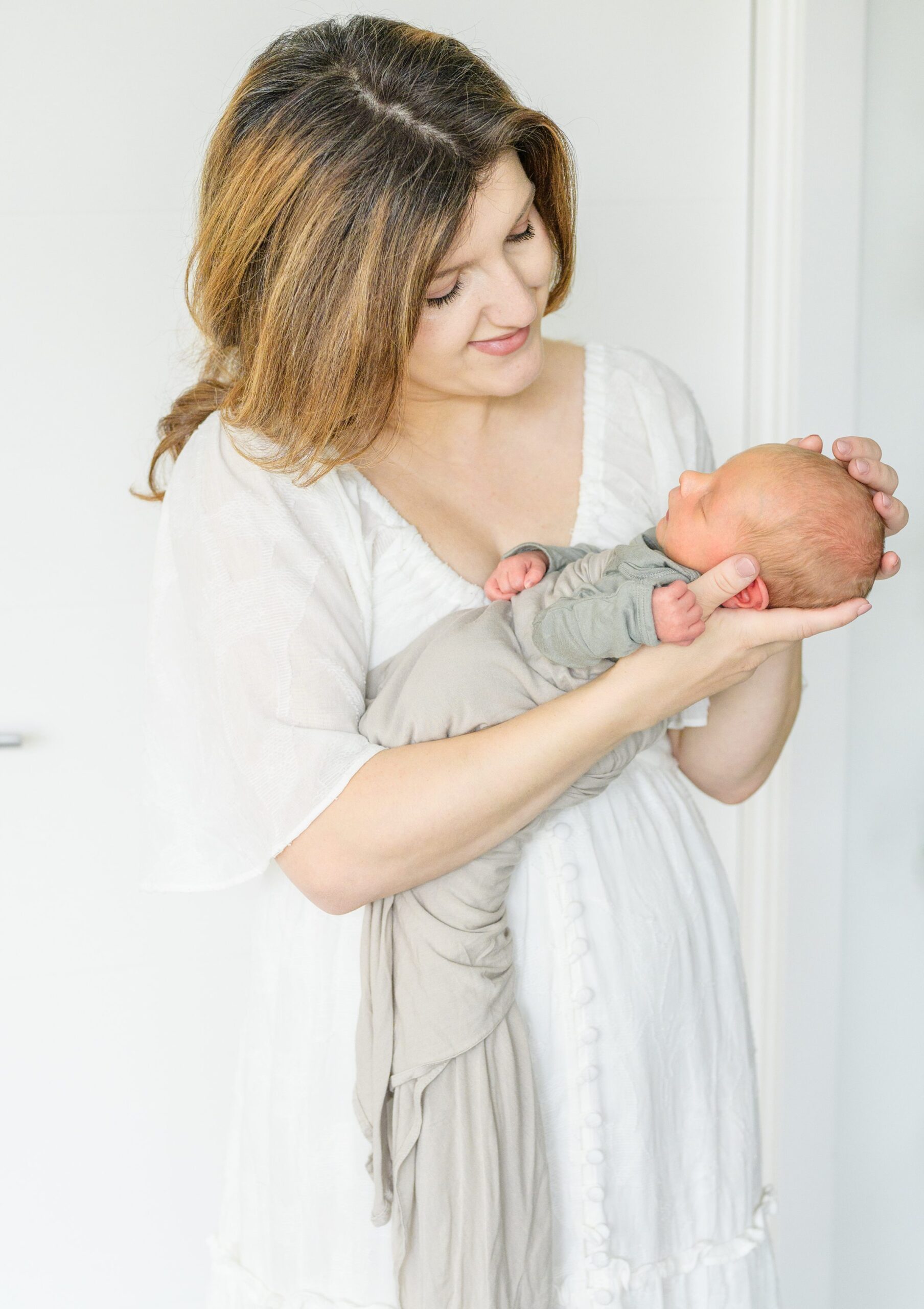 In-home newborn and family portrait session in Washington, D.C. photographed by Lifestyle Newborn Photographer Cait Kramer Photography.