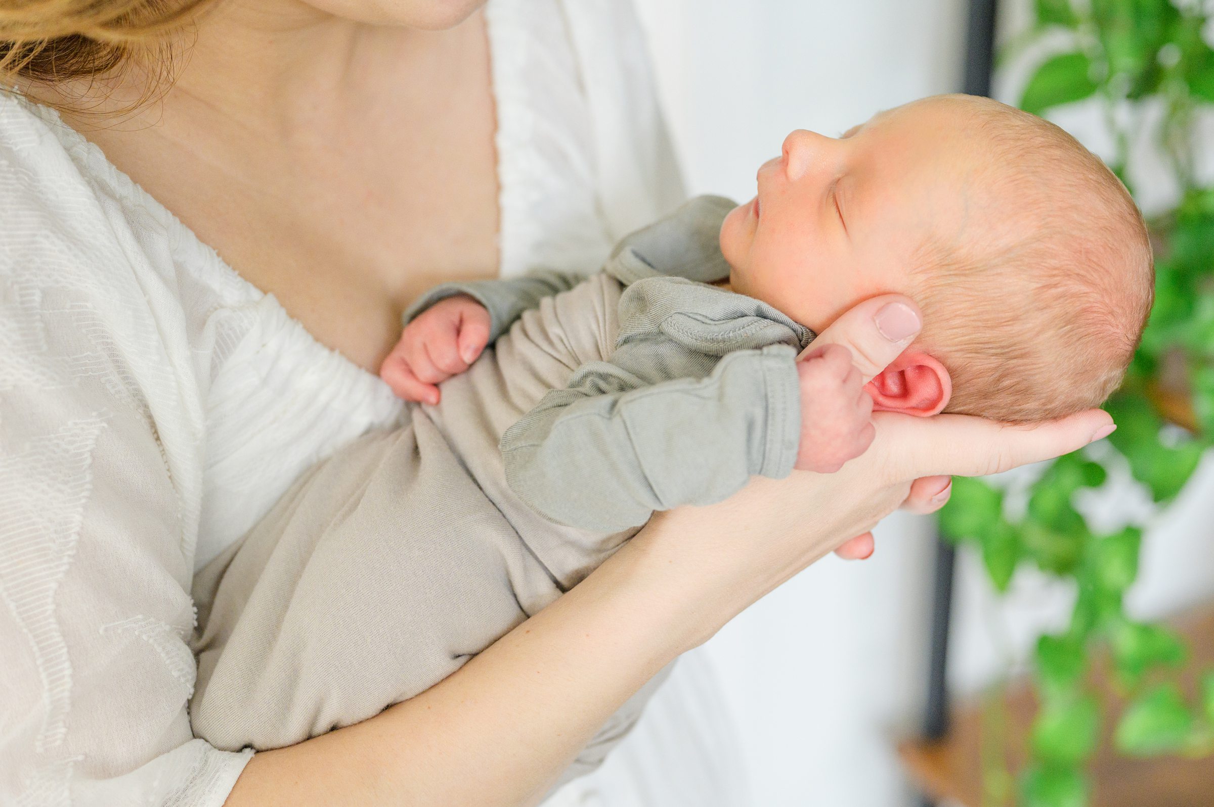 In-home newborn and family portrait session in Washington, D.C. photographed by Lifestyle Newborn Photographer Cait Kramer Photography.