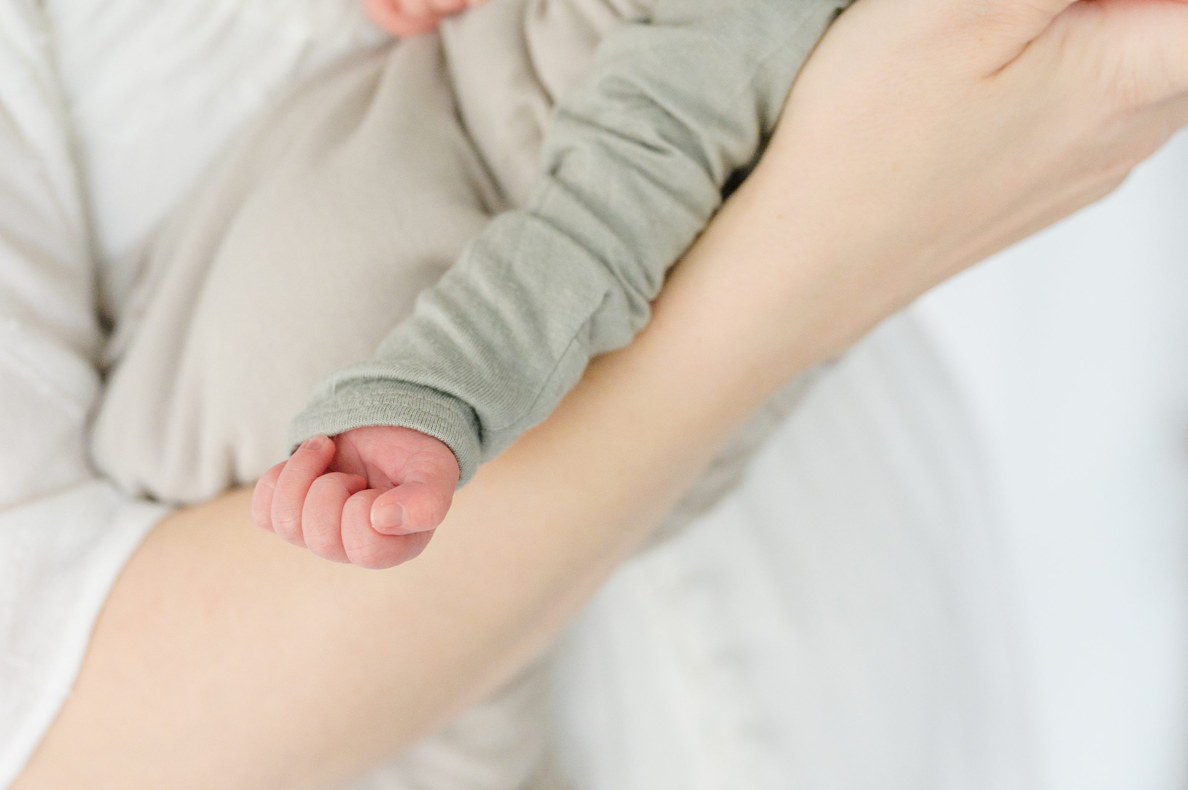 In-home newborn and family portrait session in Washington, D.C. photographed by Lifestyle Newborn Photographer Cait Kramer Photography.