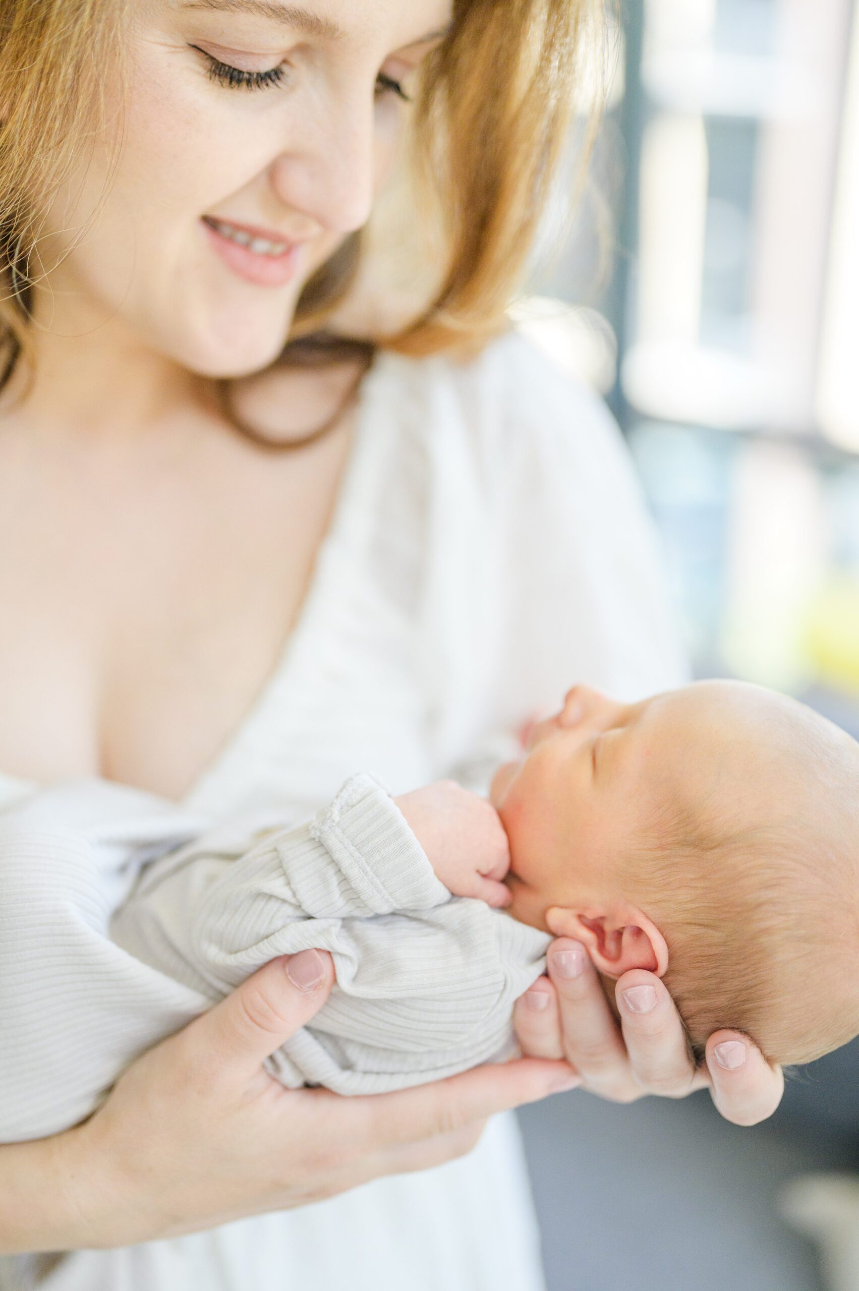 In-home newborn and family portrait session in Washington, D.C. photographed by Lifestyle Newborn Photographer Cait Kramer Photography.