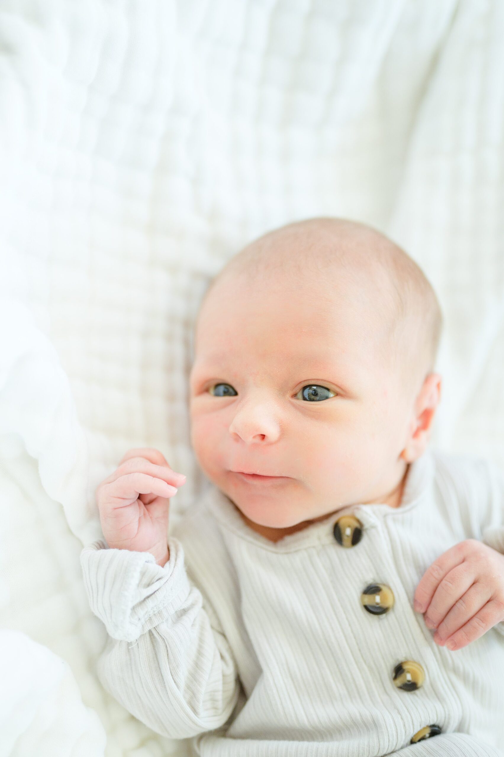 In-home newborn and family portrait session in Washington, D.C. photographed by Lifestyle Newborn Photographer Cait Kramer Photography.