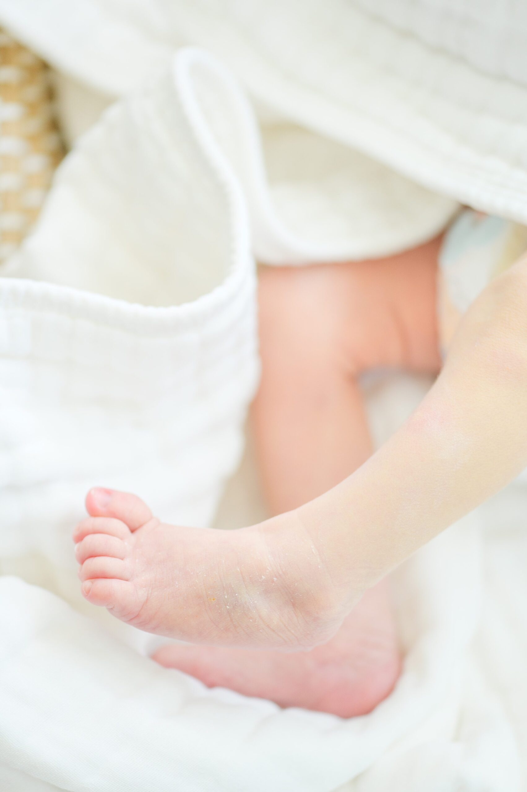 In-home newborn and family portrait session in Washington, D.C. photographed by Lifestyle Newborn Photographer Cait Kramer Photography.