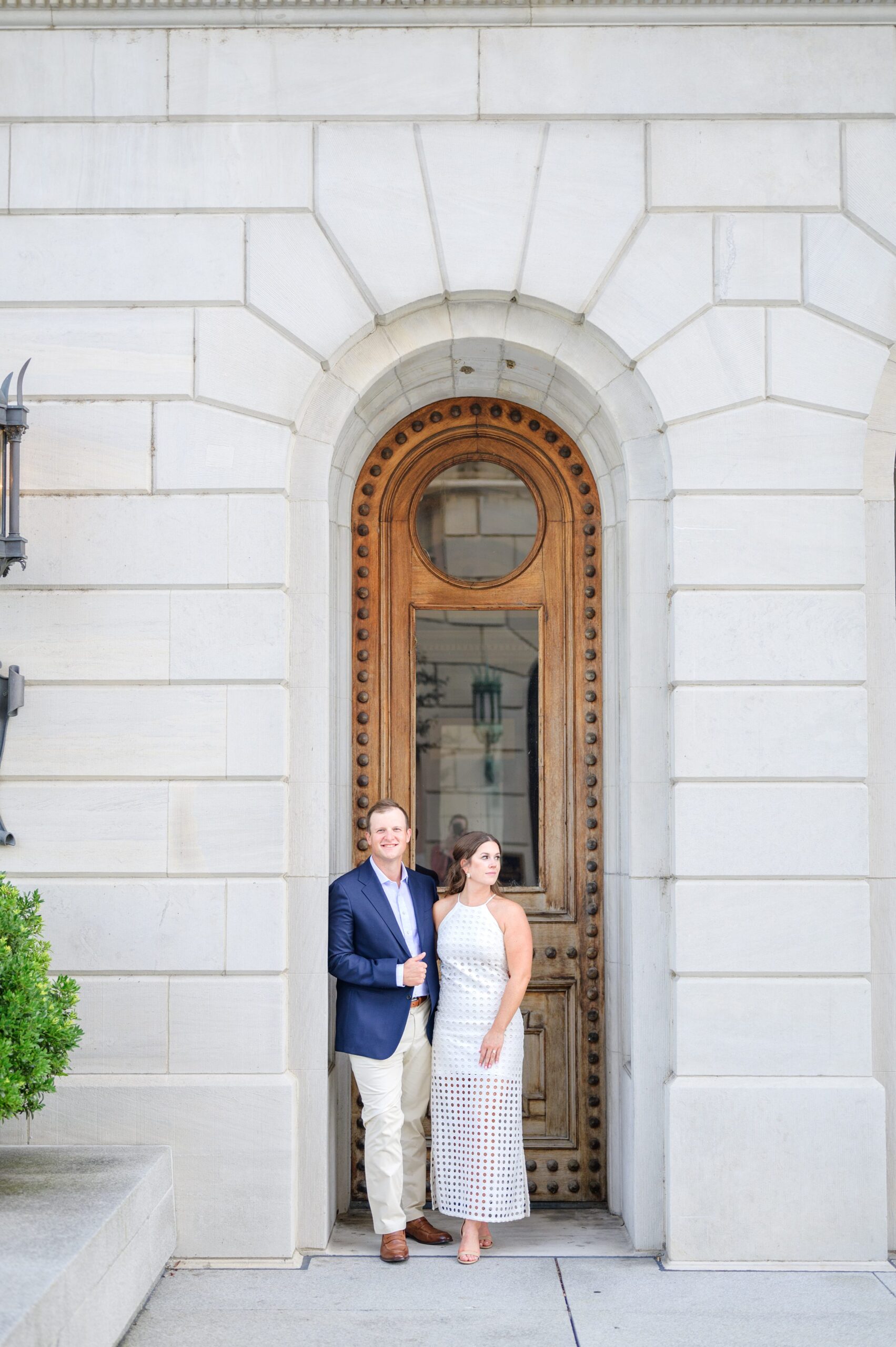 Engaged couple at the Pennsylvania State Capitol for their summer engagement session photographed by Baltimore Wedding Photographer Cait Kramer Photography.