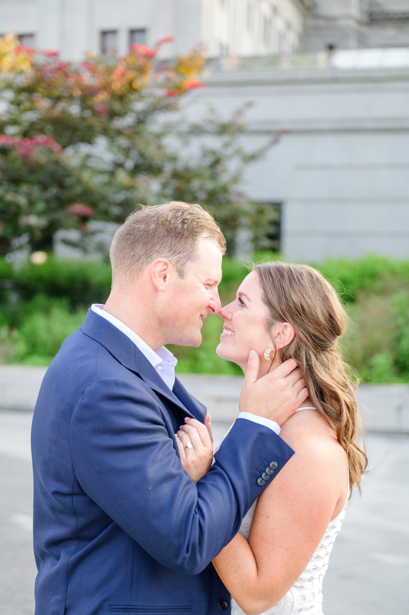 Engaged couple at the Pennsylvania State Capitol for their summer engagement session photographed by Baltimore Wedding Photographer Cait Kramer Photography.