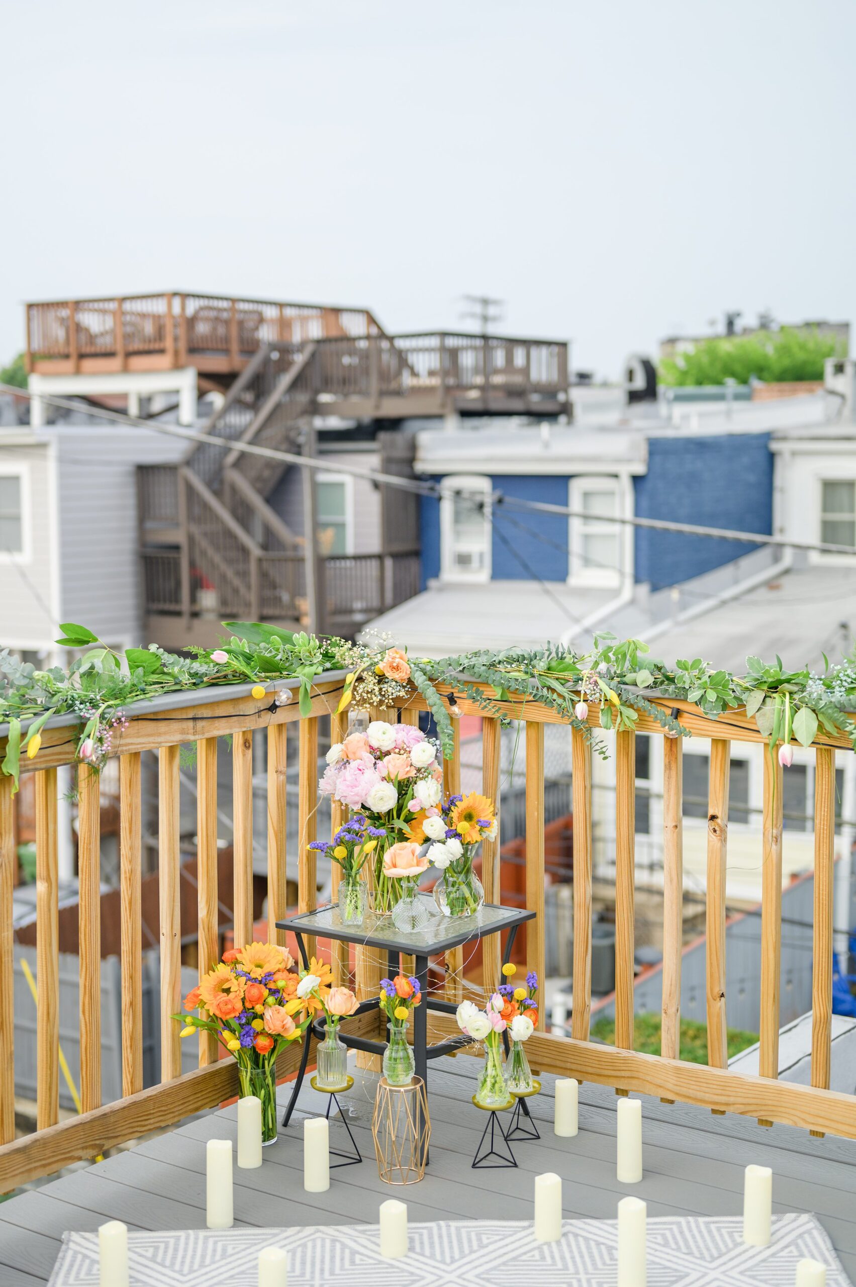 Sarah and Brenton's surprise proposal at their apartment rooftop in Baltimore, Maryland photographed by Baltimore Wedding Photographer Cait Kramer.