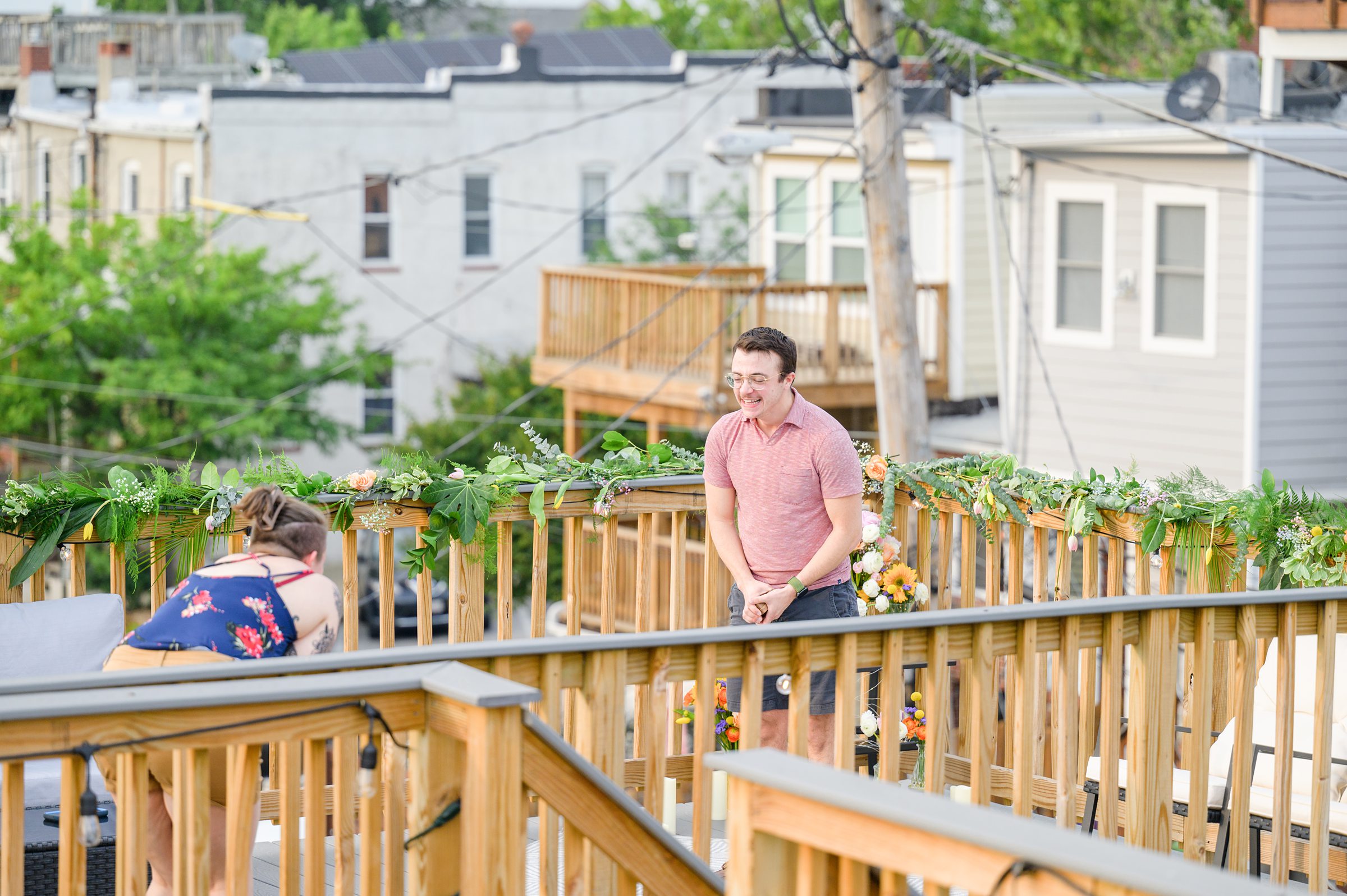 Sarah and Brenton's surprise proposal at their apartment rooftop in Baltimore, Maryland photographed by Baltimore Wedding Photographer Cait Kramer.