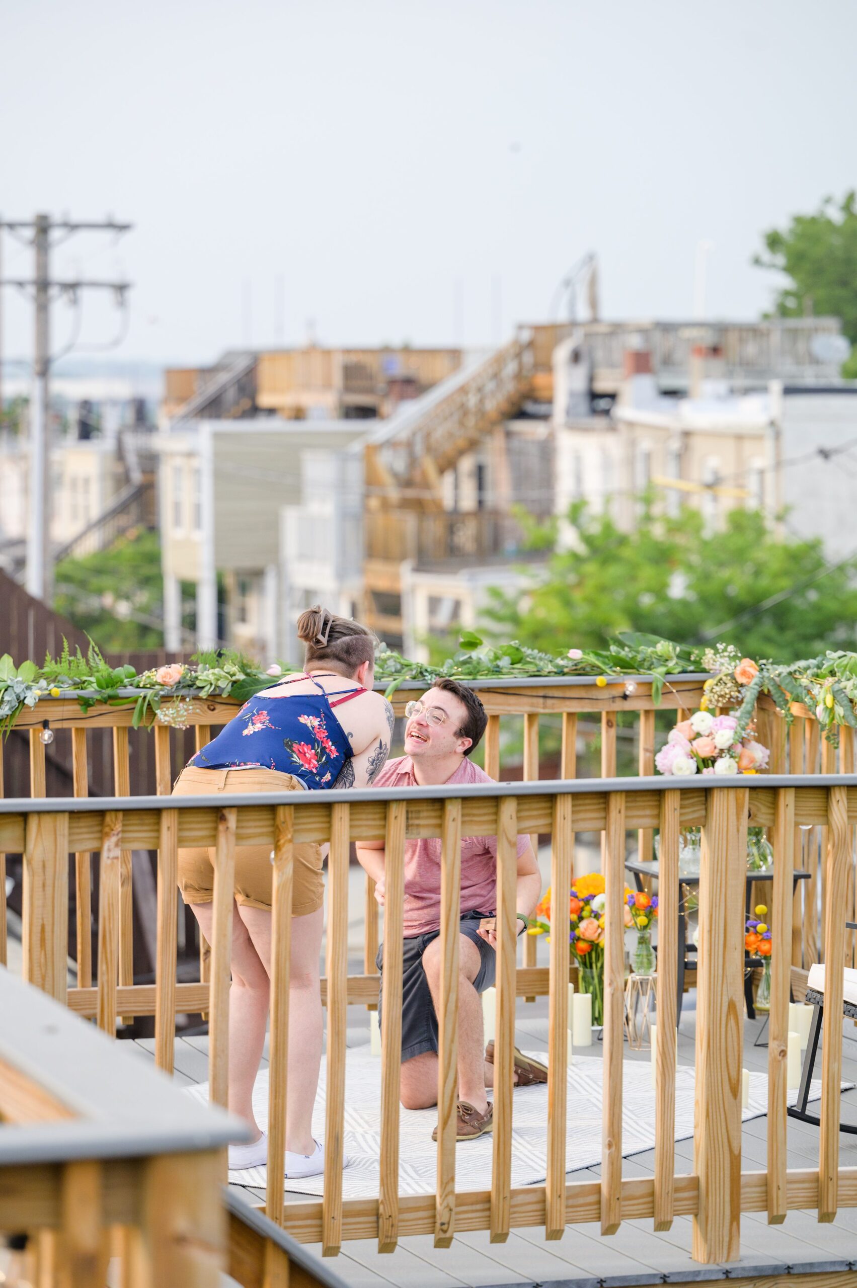 Sarah and Brenton's surprise proposal at their apartment rooftop in Baltimore, Maryland photographed by Baltimore Wedding Photographer Cait Kramer.