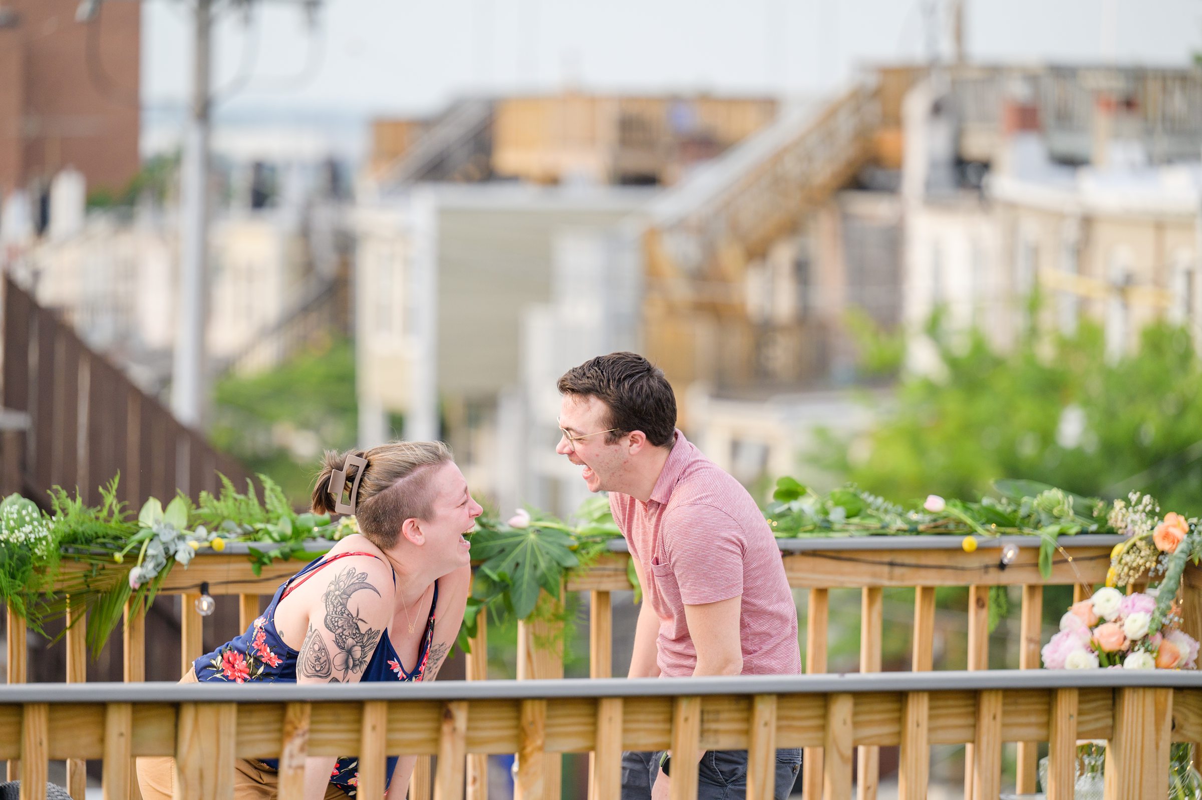 Sarah and Brenton's surprise proposal at their apartment rooftop in Baltimore, Maryland photographed by Baltimore Wedding Photographer Cait Kramer.