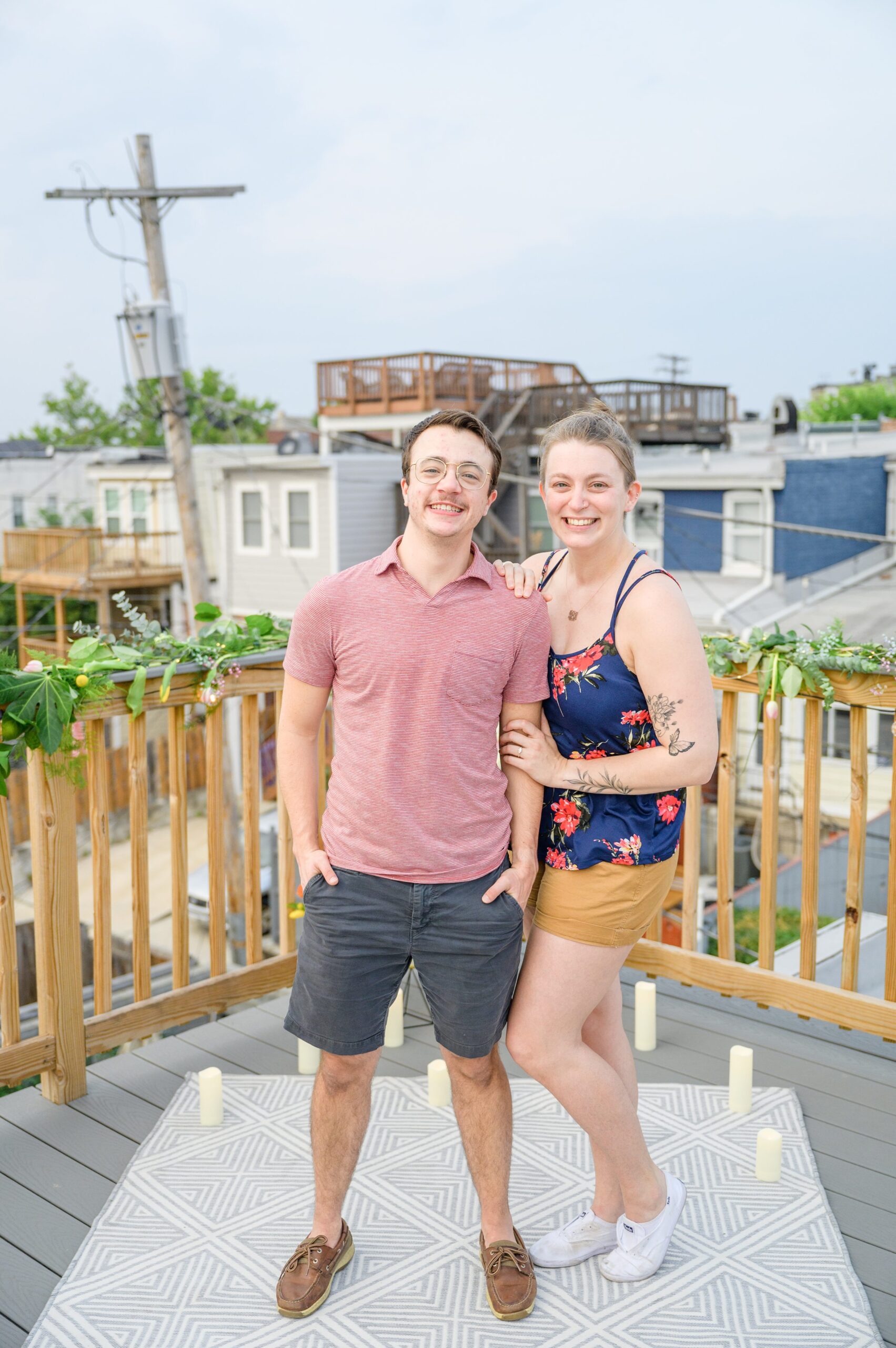 Sarah and Brenton's surprise proposal at their apartment rooftop in Baltimore, Maryland photographed by Baltimore Wedding Photographer Cait Kramer.