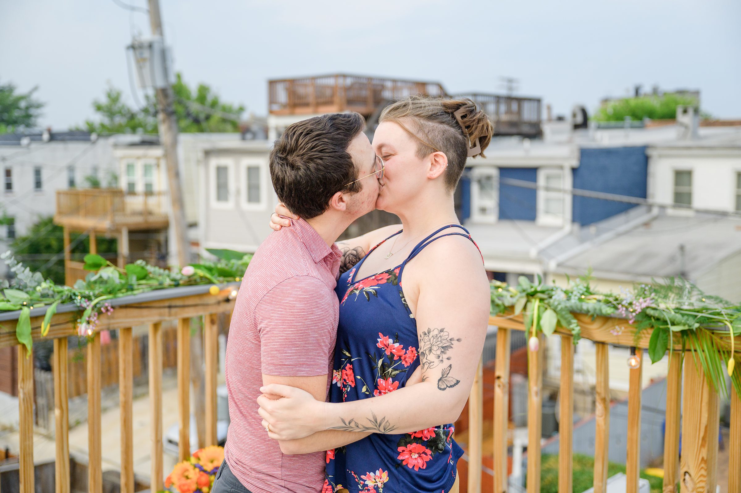 Sarah and Brenton's surprise proposal at their apartment rooftop in Baltimore, Maryland photographed by Baltimore Wedding Photographer Cait Kramer.