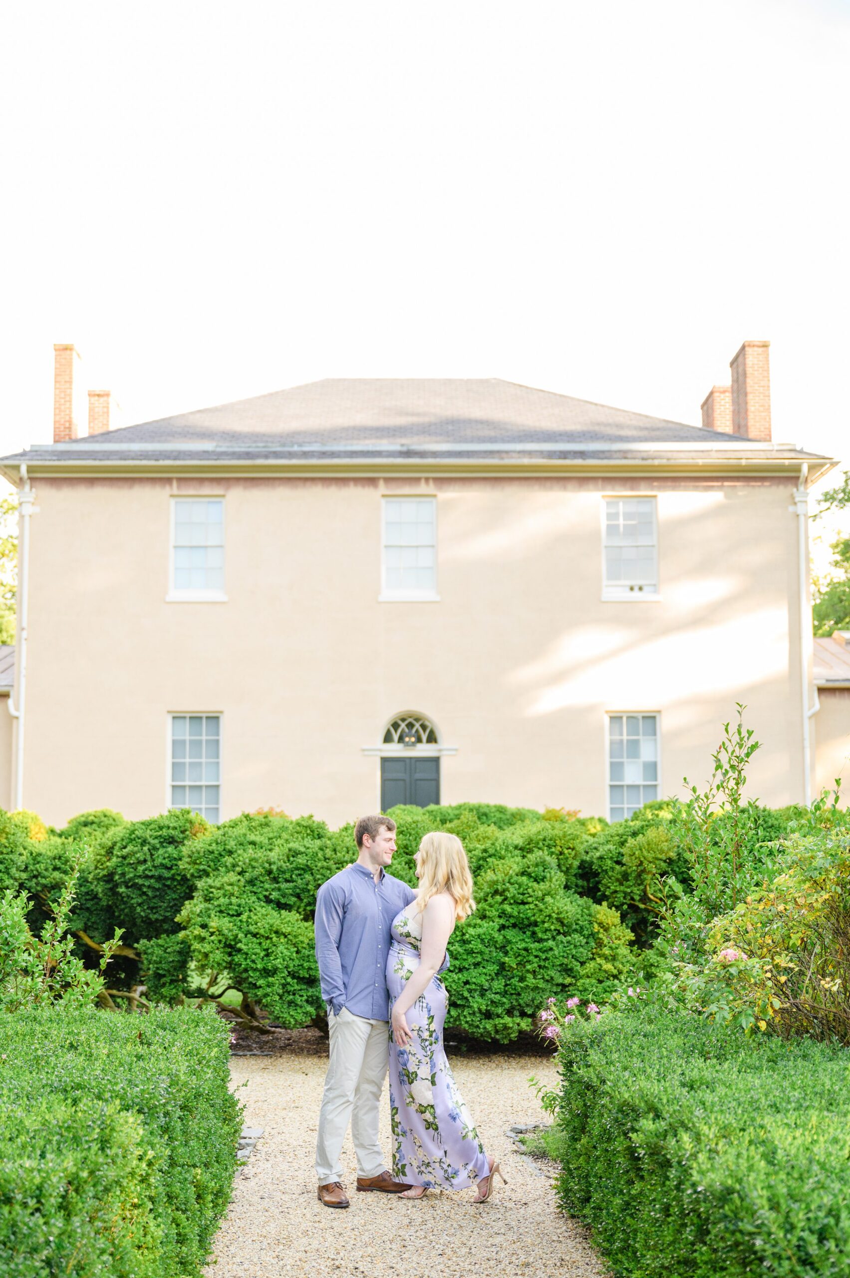 Engaged couple at the historic Tudor Place for their summer engagement session in the Georgetown neighborhood of Washington DC. Photographed by Baltimore Wedding Photographer Cait Kramer Photography.