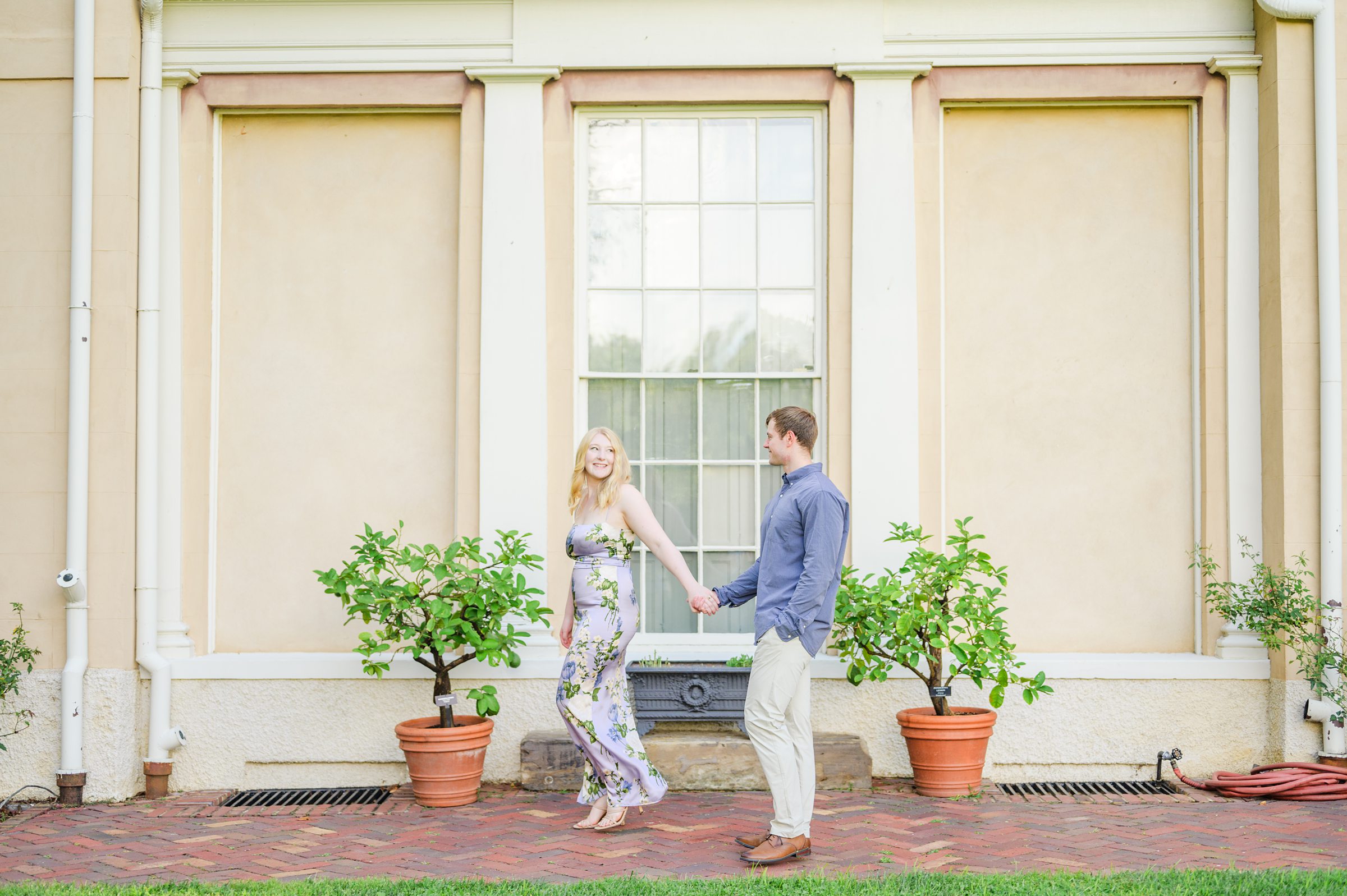 Engaged couple at the historic Tudor Place for their summer engagement session in the Georgetown neighborhood of Washington DC. Photographed by Baltimore Wedding Photographer Cait Kramer Photography.