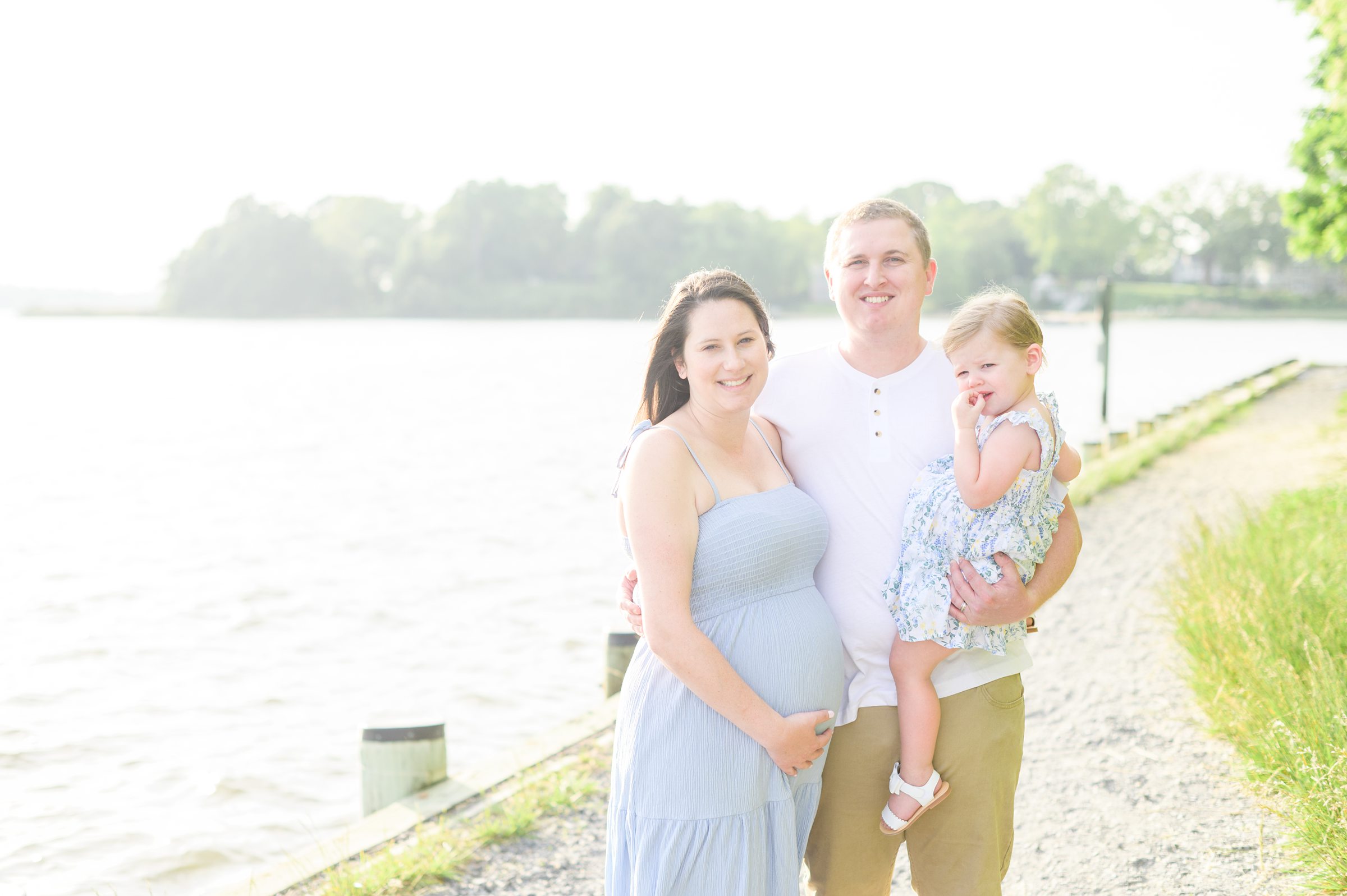 Waterfront maternity portrait session photographed by Baltimore Maternity and Newborn Photographer Cait Kramer.