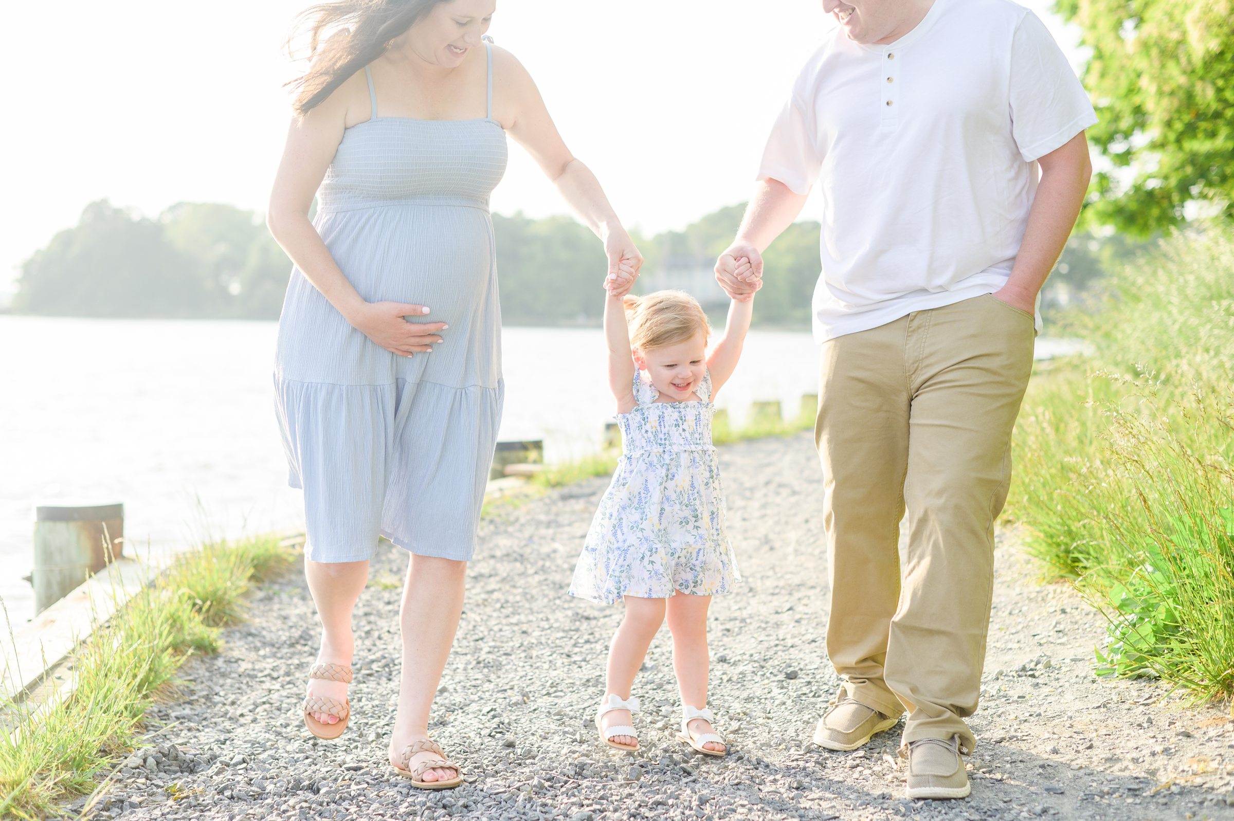 Waterfront maternity portrait session photographed by Baltimore Maternity and Newborn Photographer Cait Kramer.