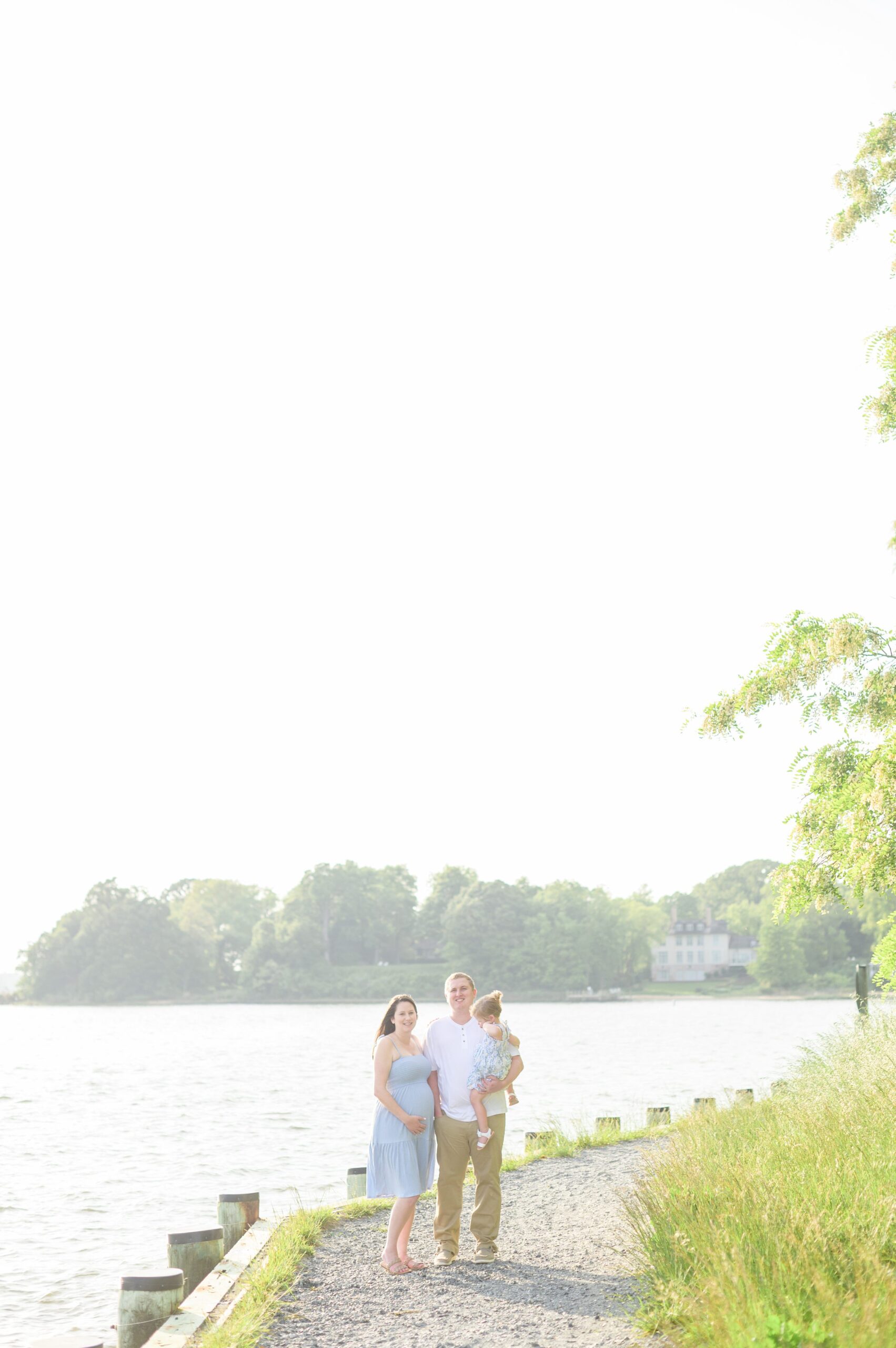 Waterfront maternity portrait session photographed by Baltimore Maternity and Newborn Photographer Cait Kramer.