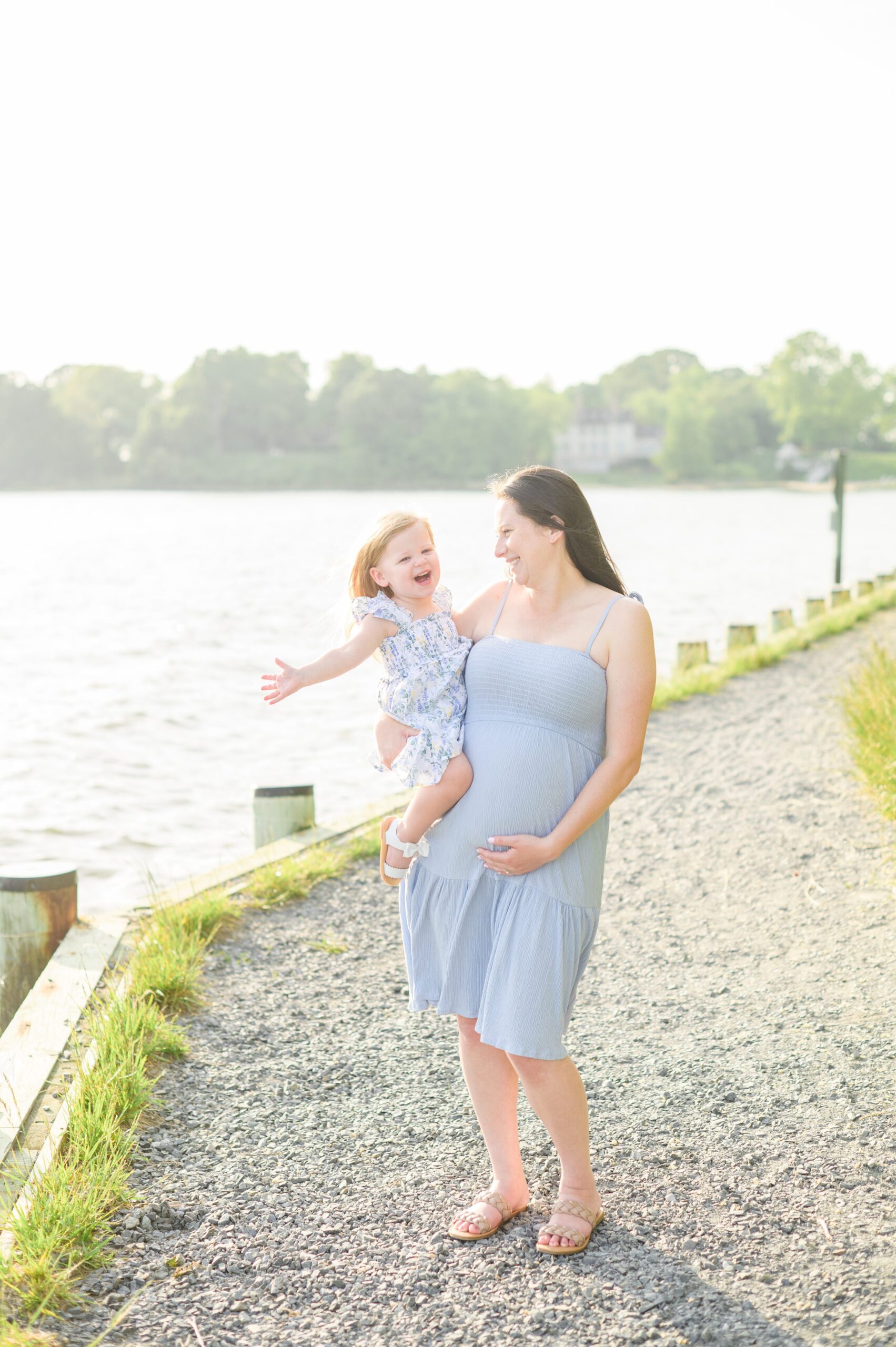 Waterfront maternity portrait session photographed by Baltimore Maternity and Newborn Photographer Cait Kramer.