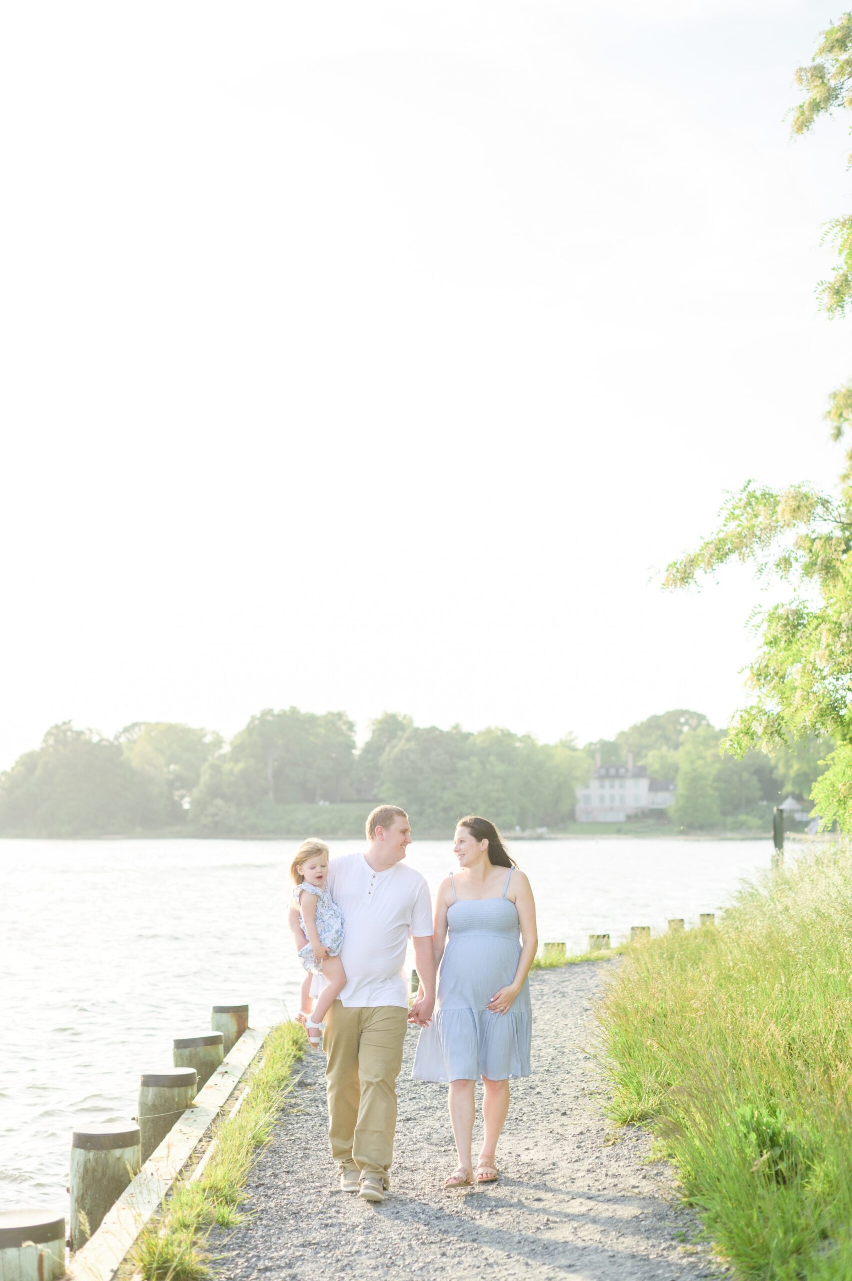 Waterfront maternity portrait session photographed by Baltimore Maternity and Newborn Photographer Cait Kramer.