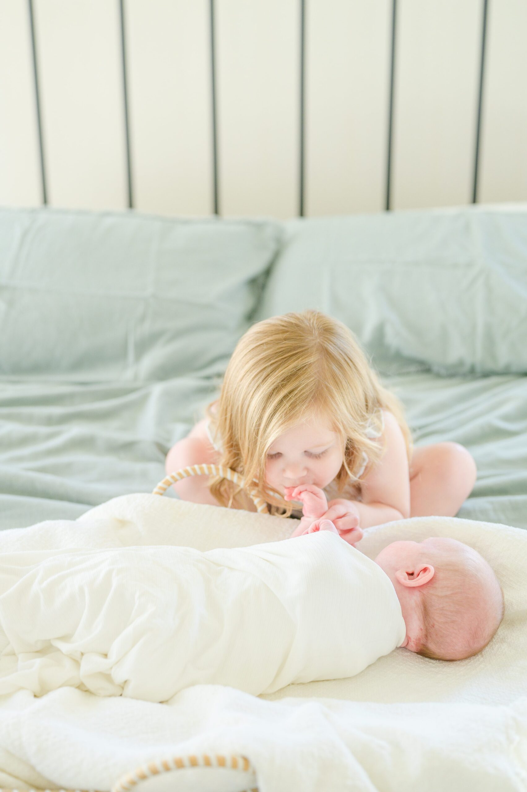 In home lifestyle newborn session photographed by Baltimore Maternity and Newborn Photographer Cait Kramer.