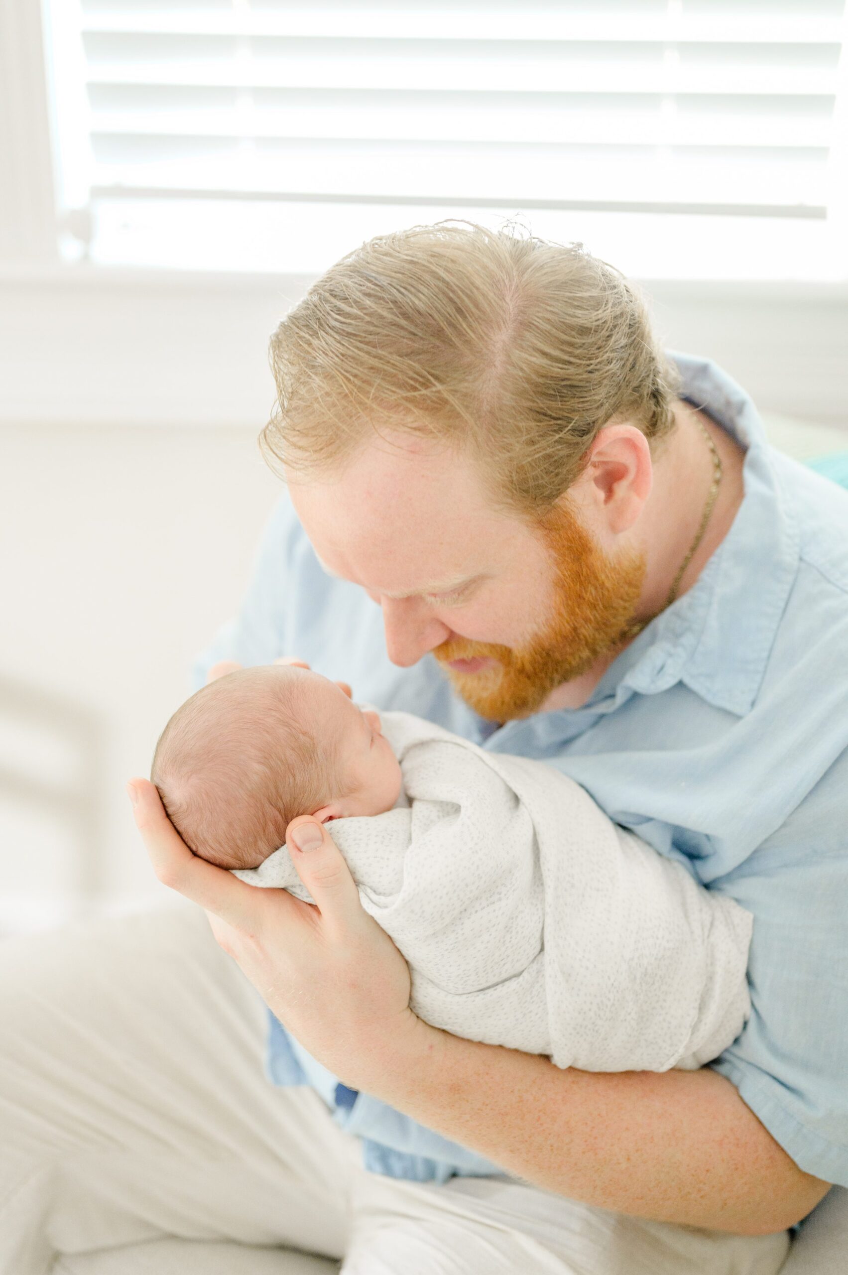 In home newborn session in Washington, DC photographed by Baltimore lifestyle newborn photographer Cait Kramer.