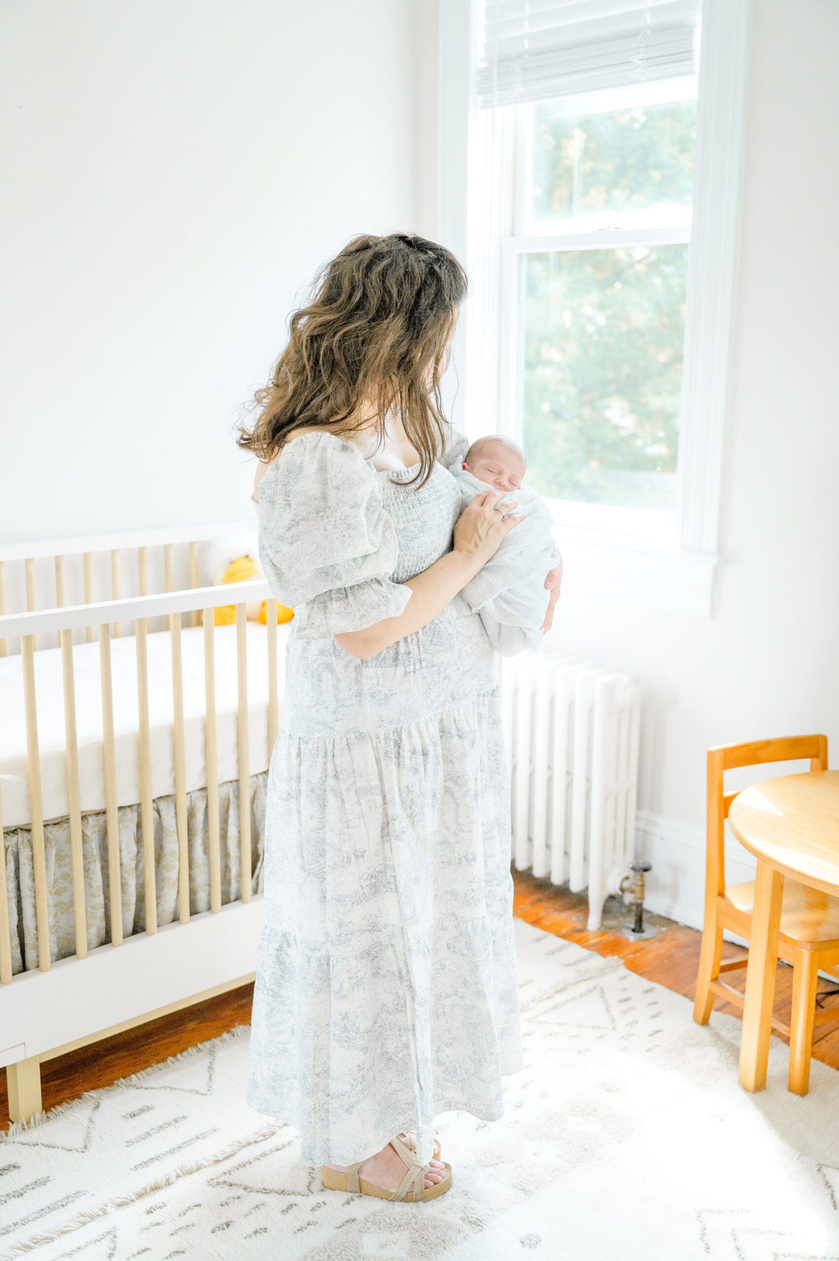 In home newborn session in Washington, DC photographed by Baltimore lifestyle newborn photographer Cait Kramer.