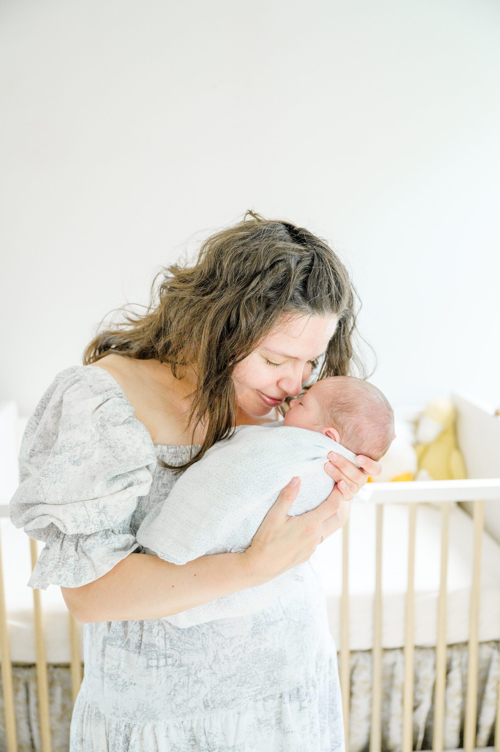 In home newborn session in Washington, DC photographed by Baltimore lifestyle newborn photographer Cait Kramer.