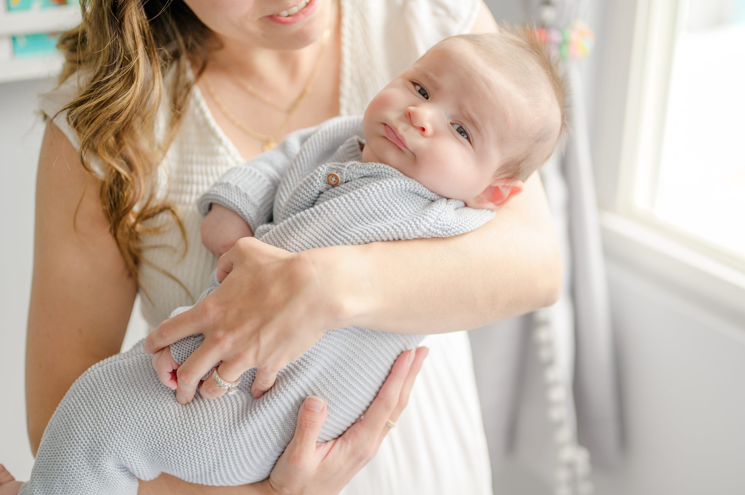 In-home newborn session in Baltimore, Maryland photographed by lifestyle family photographer Cait Kramer.