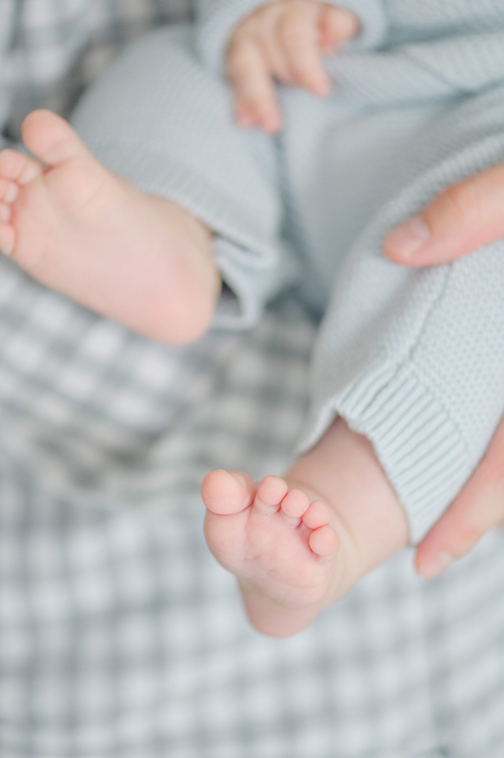 In-home newborn session in Baltimore, Maryland photographed by lifestyle family photographer Cait Kramer.