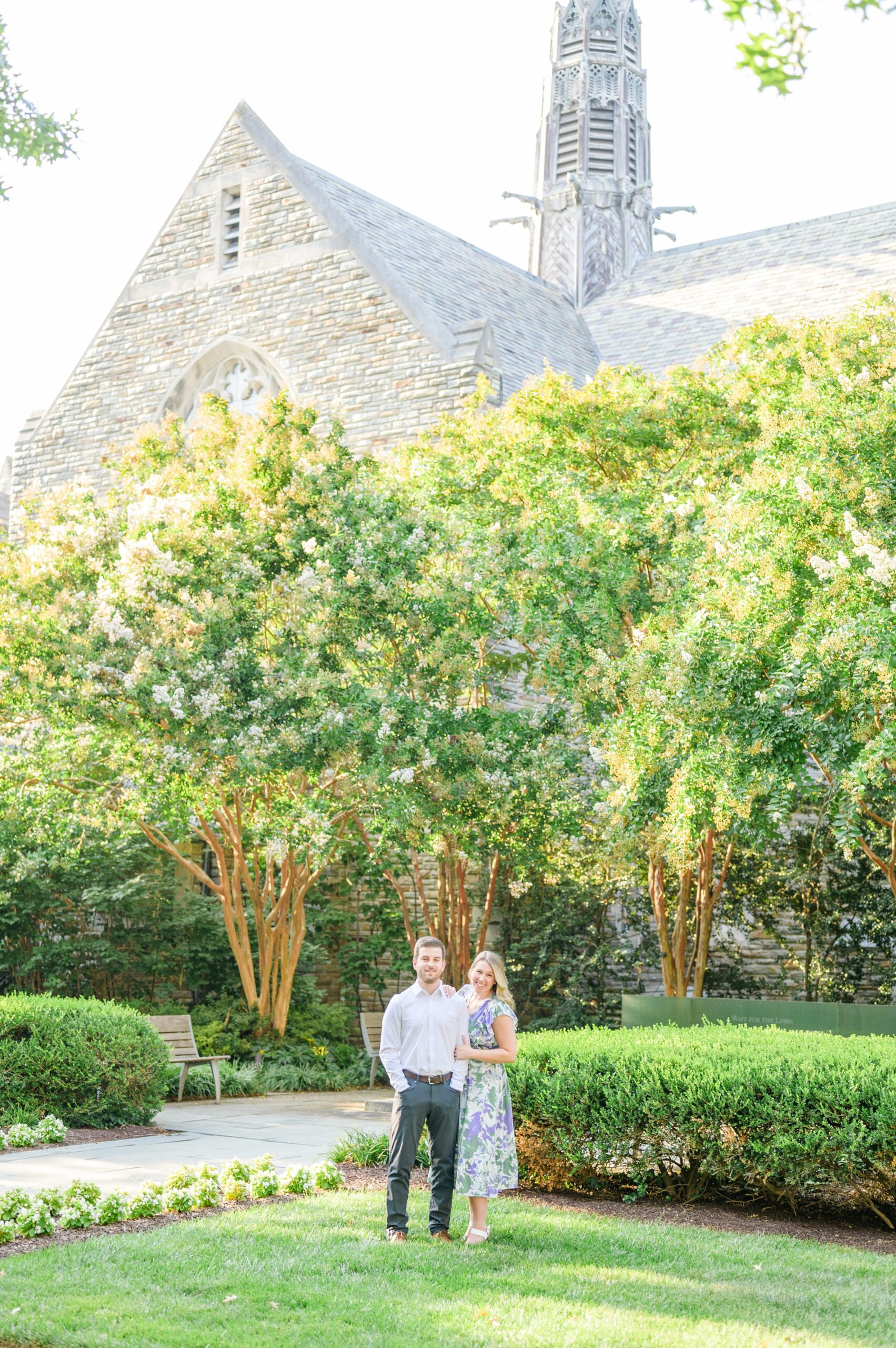 Engaged couple at the Loyola University Maryland campus for their summer engagement session in Baltimore, MD photographed by Baltimore Wedding Photographer Cait Kramer Photography