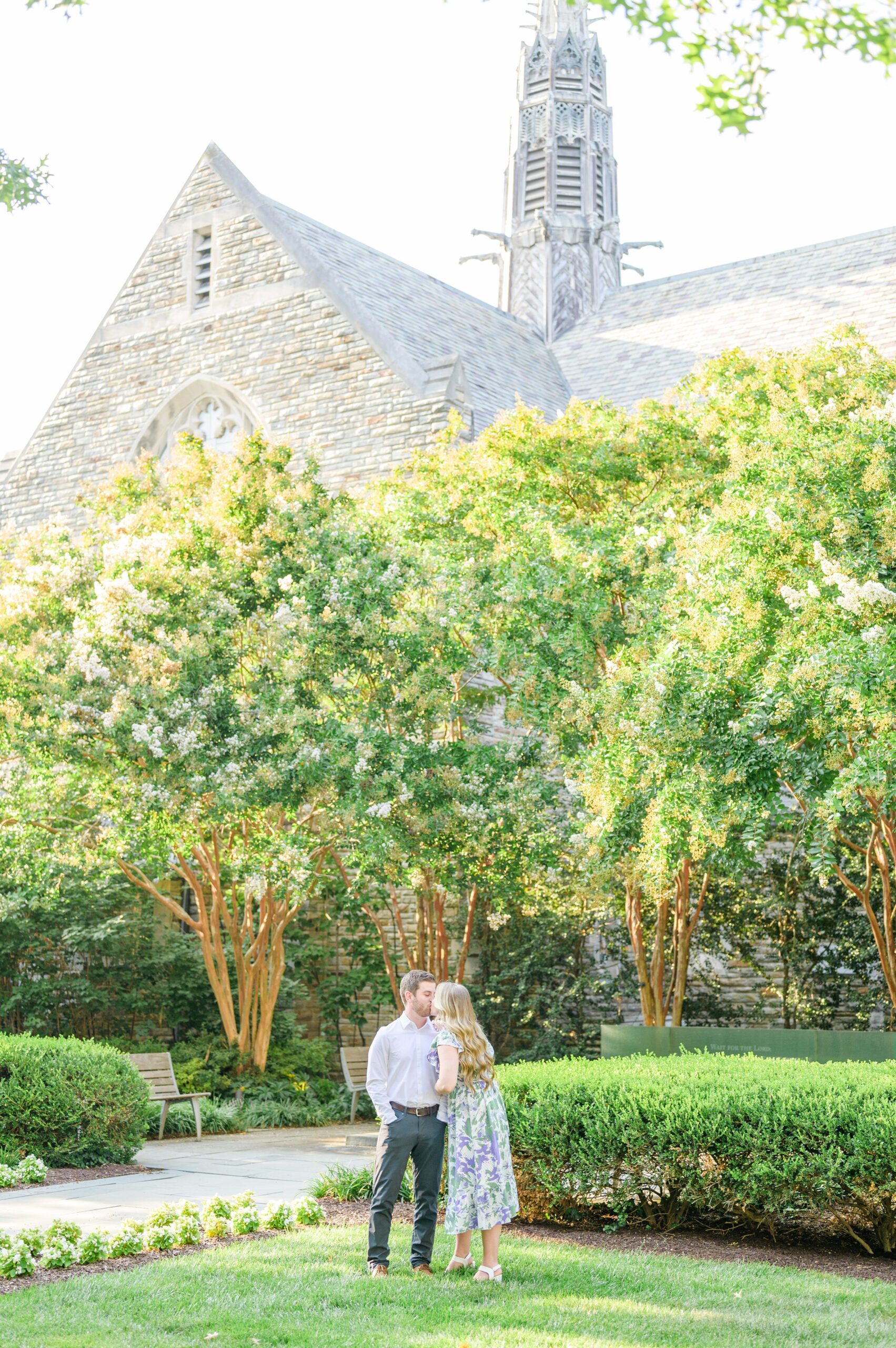 Engaged couple at the Loyola University Maryland campus for their summer engagement session in Baltimore, MD photographed by Baltimore Wedding Photographer Cait Kramer Photography