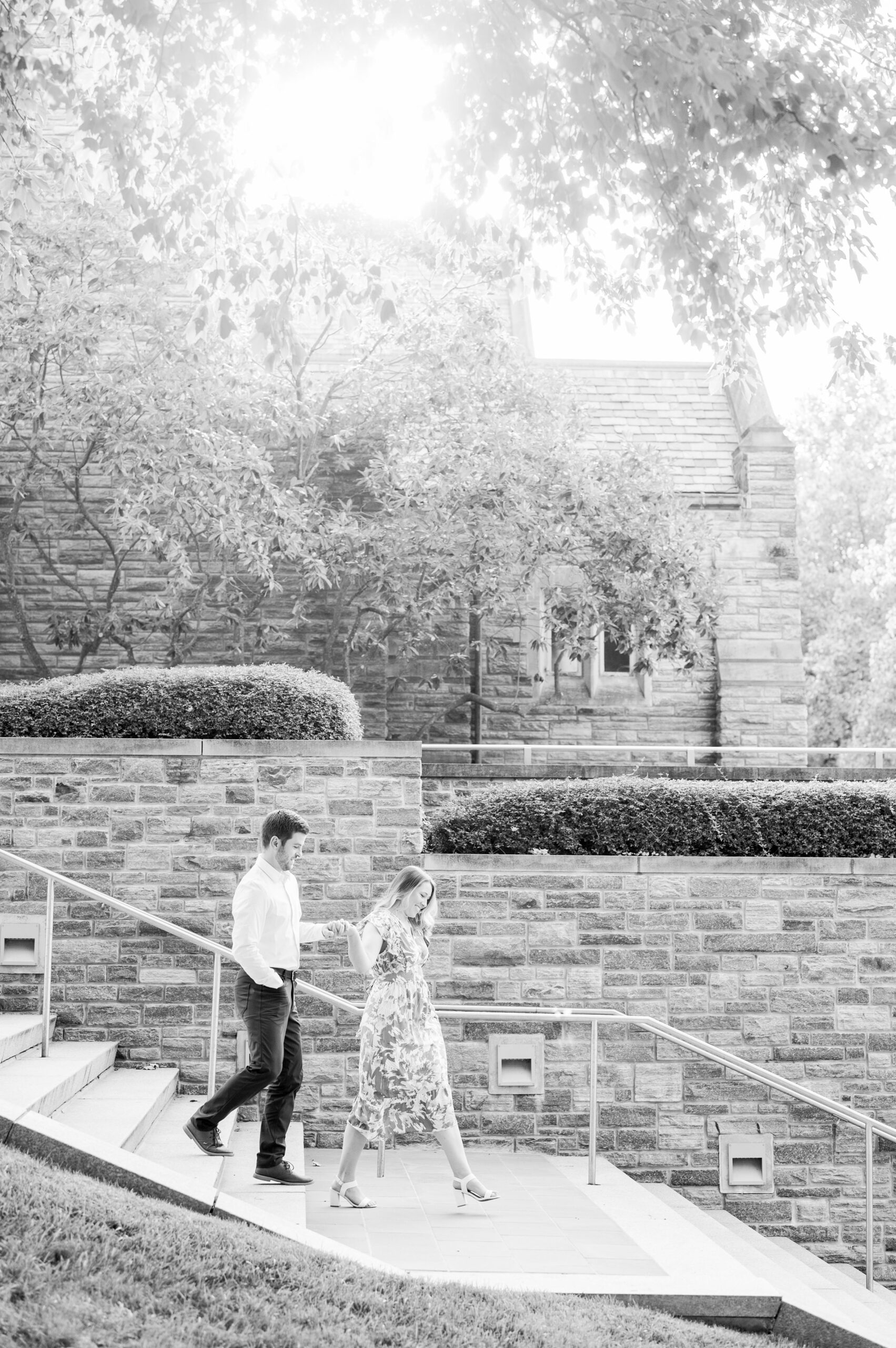 Engaged couple at the Loyola University Maryland campus for their summer engagement session in Baltimore, MD photographed by Baltimore Wedding Photographer Cait Kramer Photography