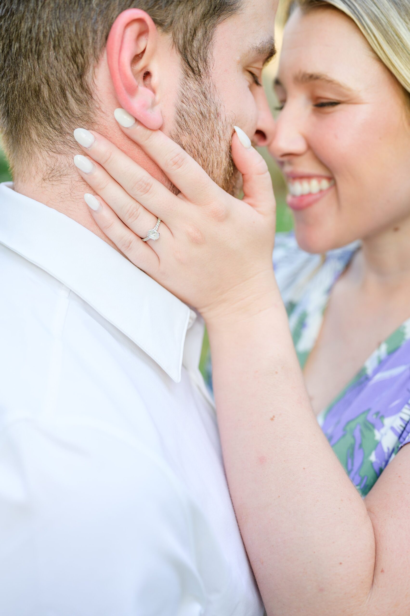 Engaged couple at the Loyola University Maryland campus for their summer engagement session in Baltimore, MD photographed by Baltimore Wedding Photographer Cait Kramer Photography