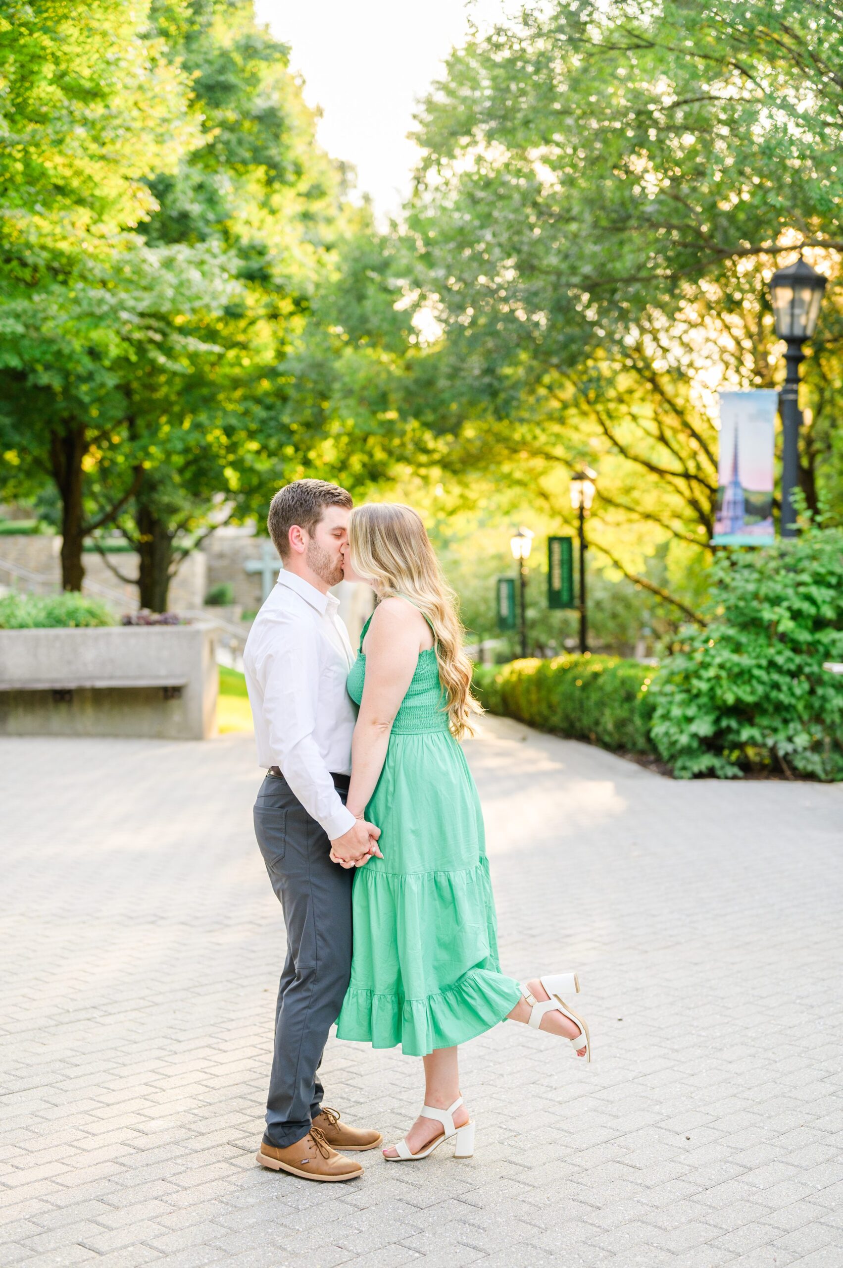 Engaged couple at the Loyola University Maryland campus for their summer engagement session in Baltimore, MD photographed by Baltimore Wedding Photographer Cait Kramer Photography
