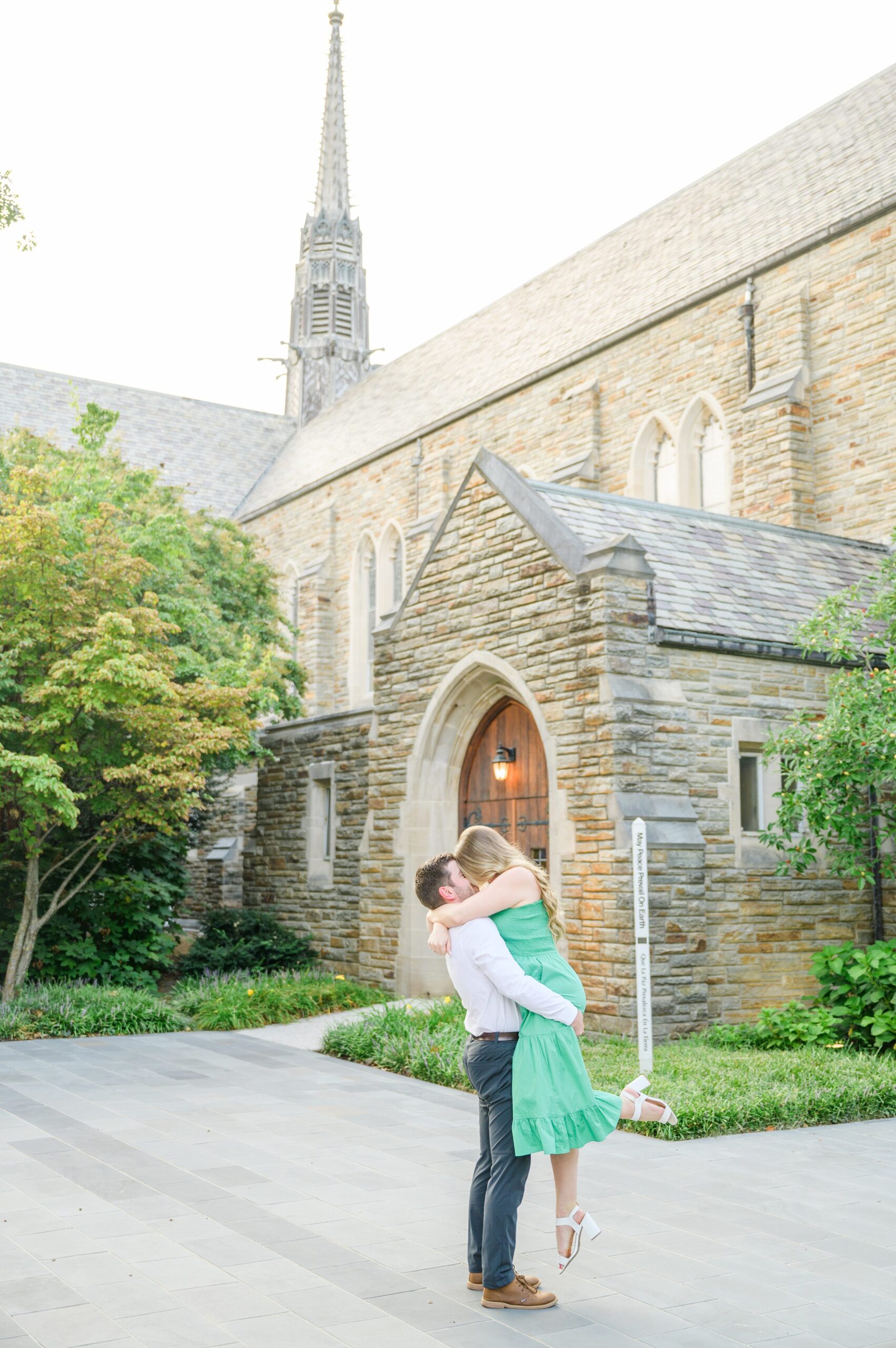 Engaged couple at the Loyola University Maryland campus for their summer engagement session in Baltimore, MD photographed by Baltimore Wedding Photographer Cait Kramer Photography