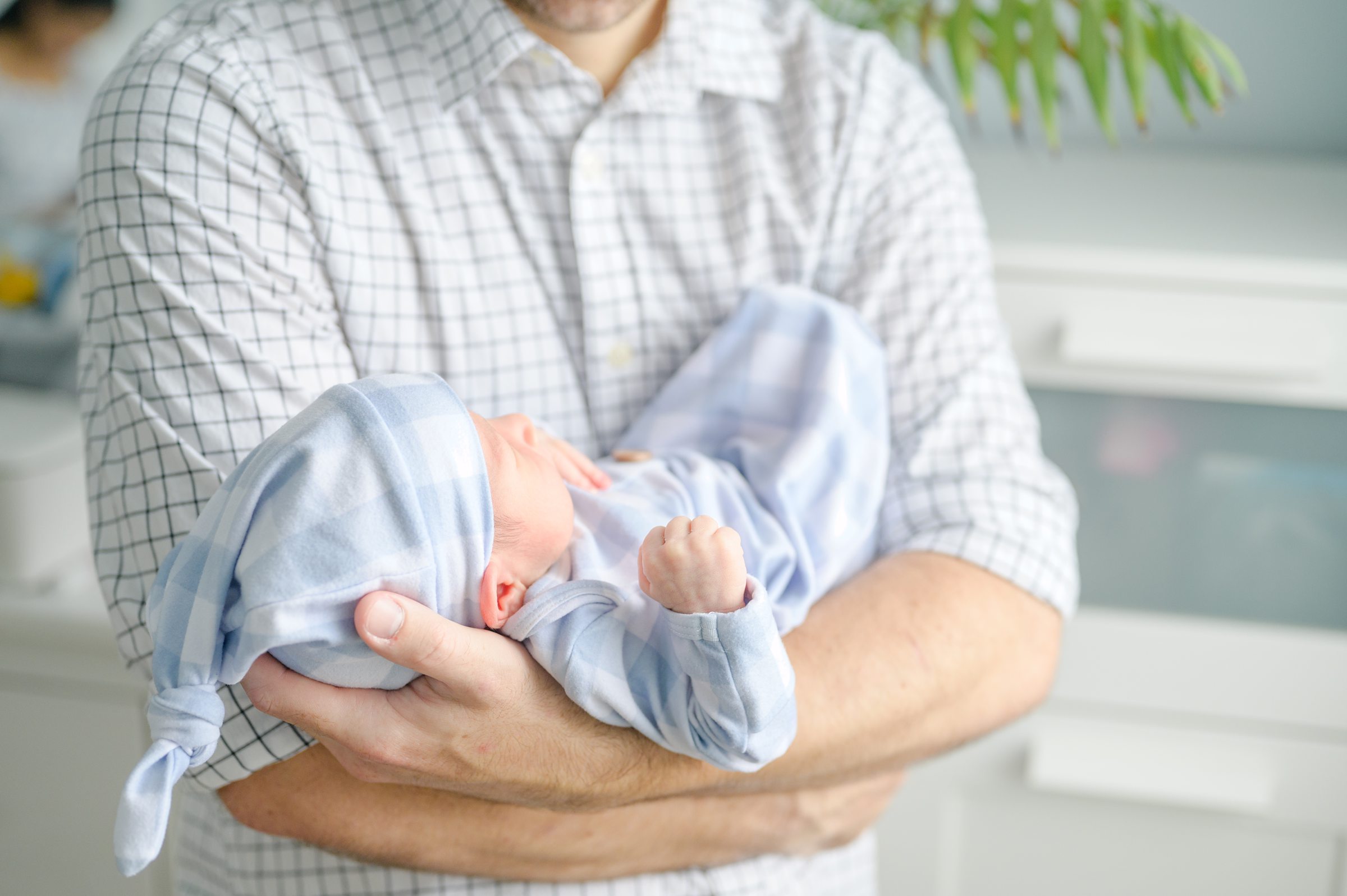 In-home Philly lifestyle newborn portrait session photographed by Cait Kramer