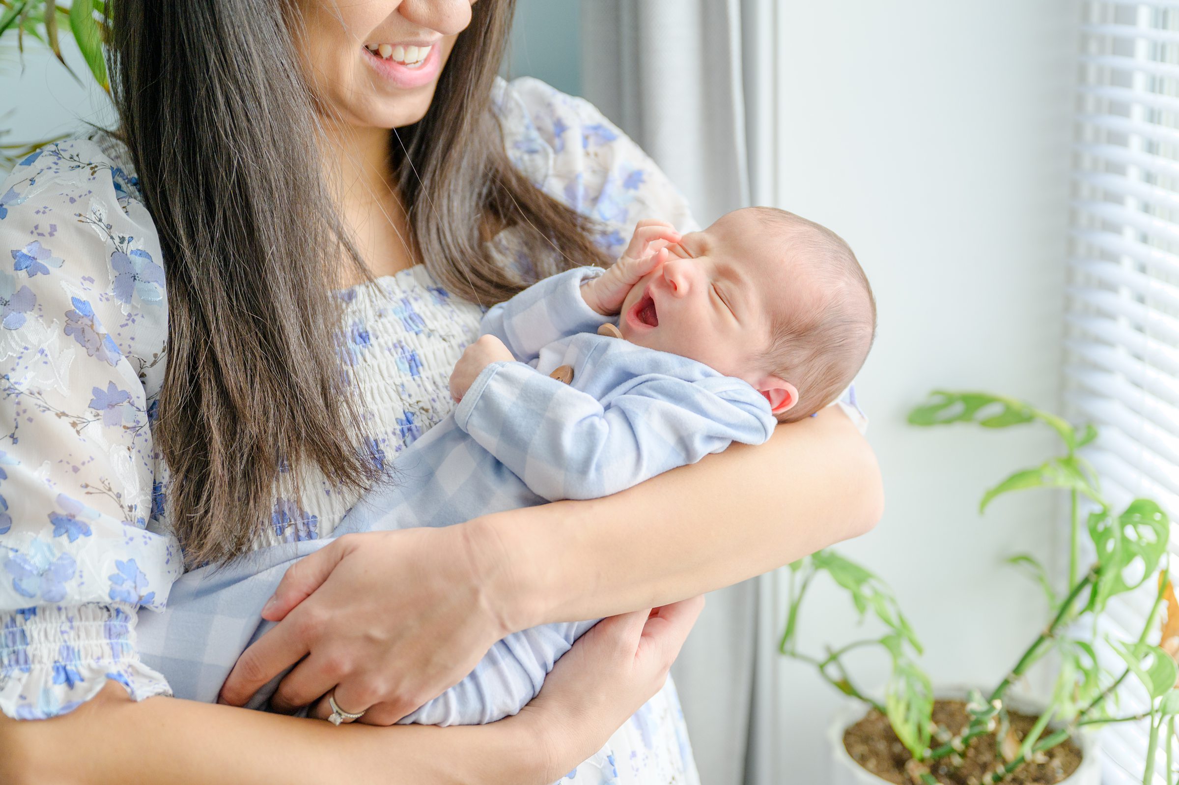 In-home Philly lifestyle newborn portrait session photographed by Cait Kramer